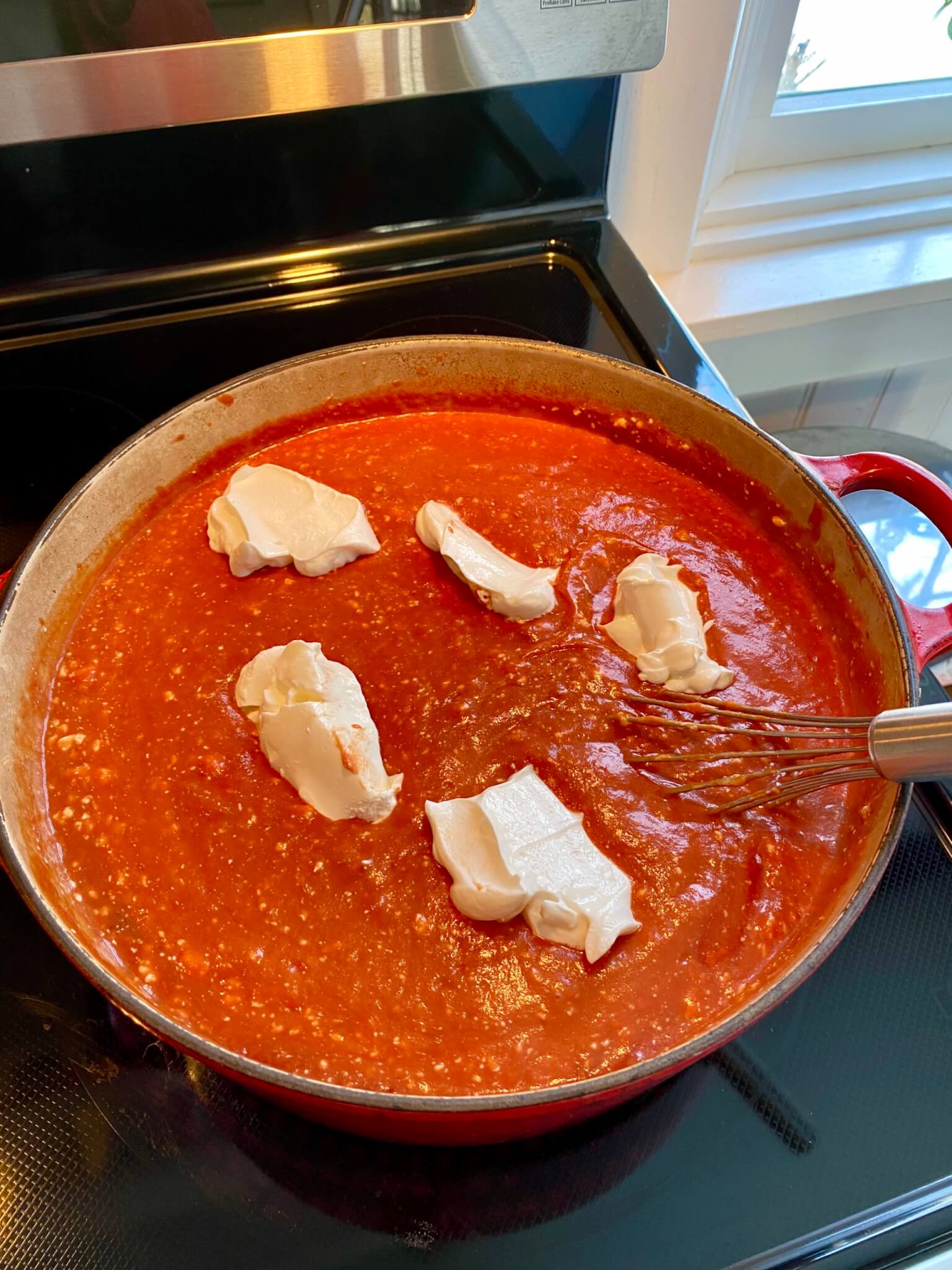 Those familiar with Isaac's restaurants have likely heard of their signature soup, which has legions of devoted fans. The popular menu item is described as a "creamy tomato soup given a zippy twist with shredded pepperjack cheese, garnished with croutons." The following copycat version adds an extra kick with hot sauce, although you could omit it if preferred.