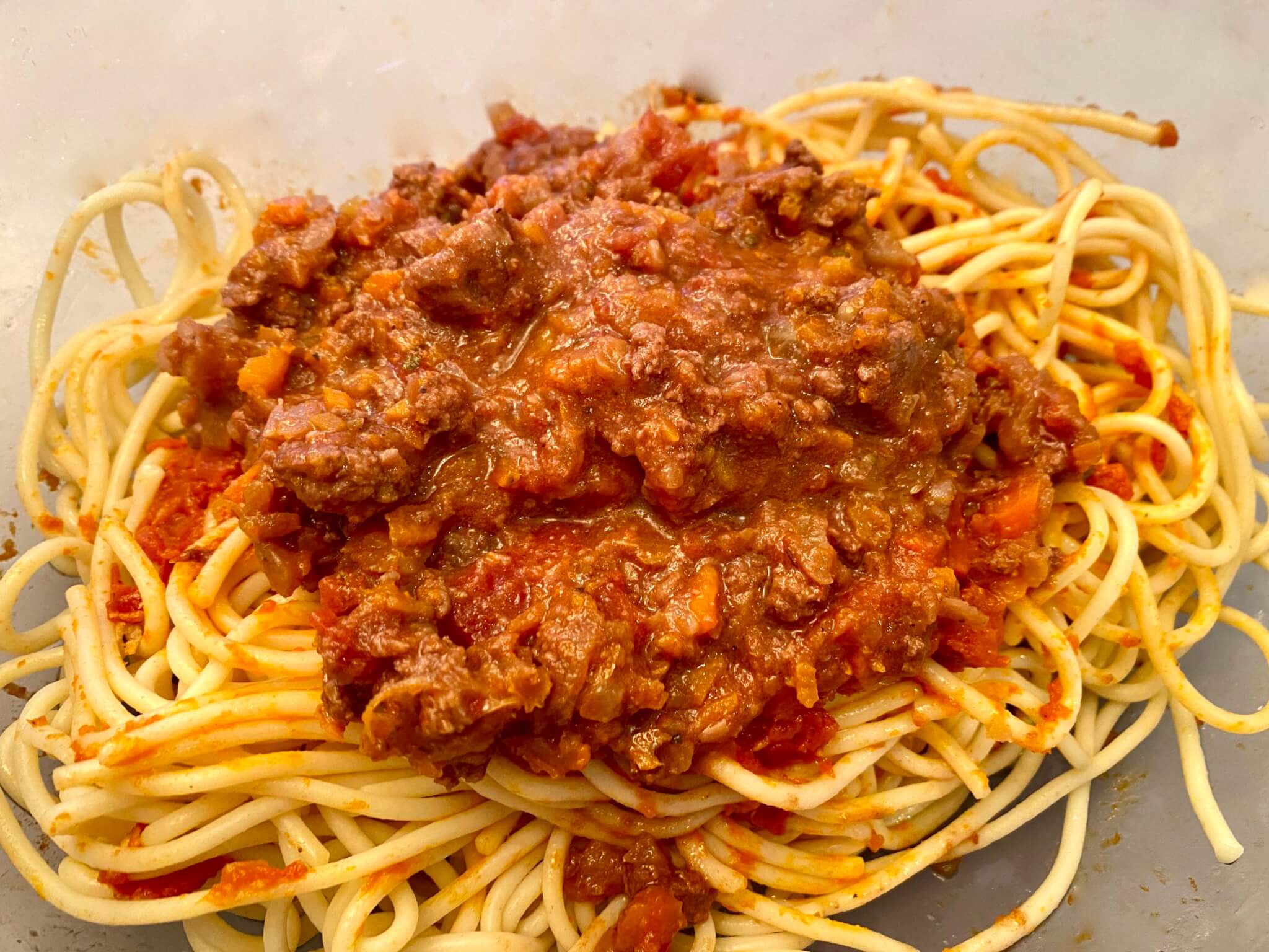 This tomato-based meat sauce is easy to prepare and makes for a memorable pasta dinner. It freezes well, too!