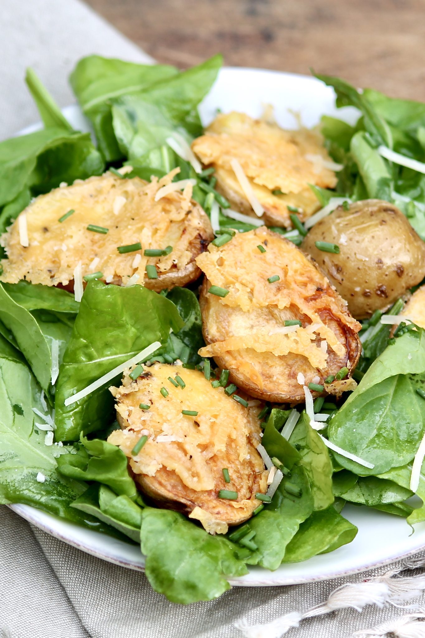 A golden crust that complements the creamy potatoes is the magic that happens when a clever baking method meets a little bit of olive oil and Parmesan cheese.And they taste great in a salad!