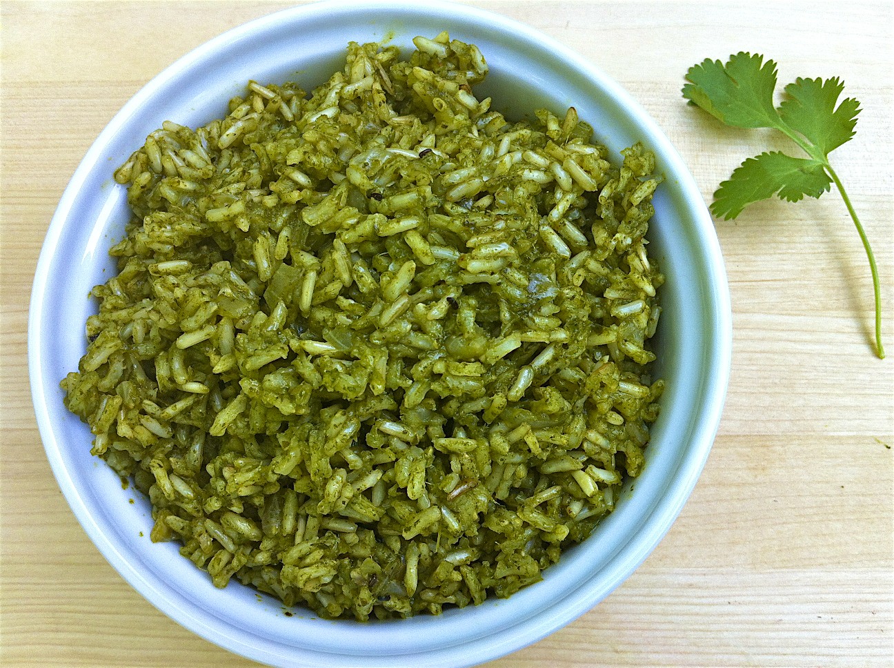 Green RIce-Bursting with flavor and good-for-you ingredients, this colorful rice complements any basic protein and a wide variety of Latin, Asian and African dishes.