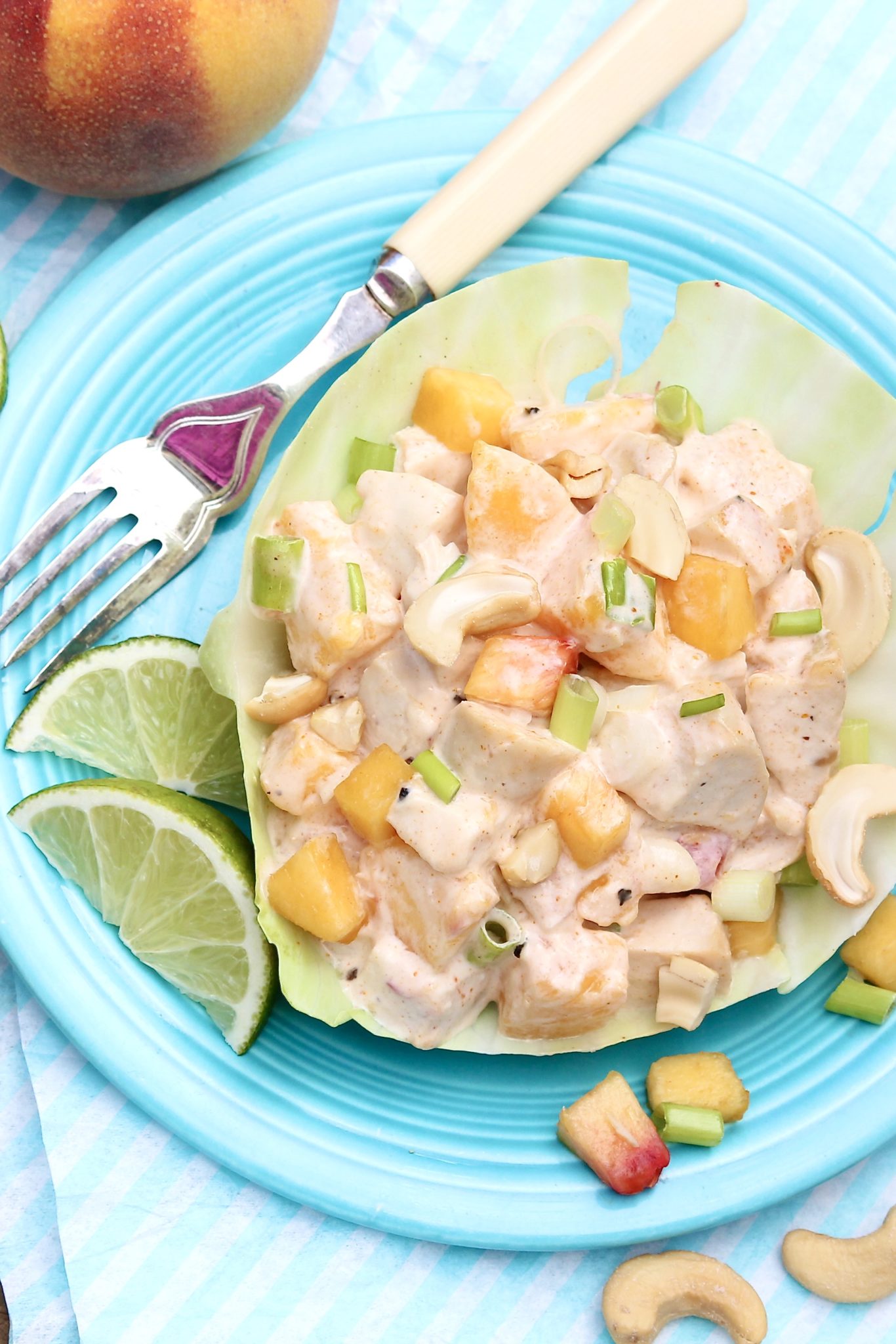 Several of the ingredients in this fresh-tasting chicken salad may be unexpected, but the combination really works! For added ease, leftover grilled, baked, or rotisserie chicken may be used.