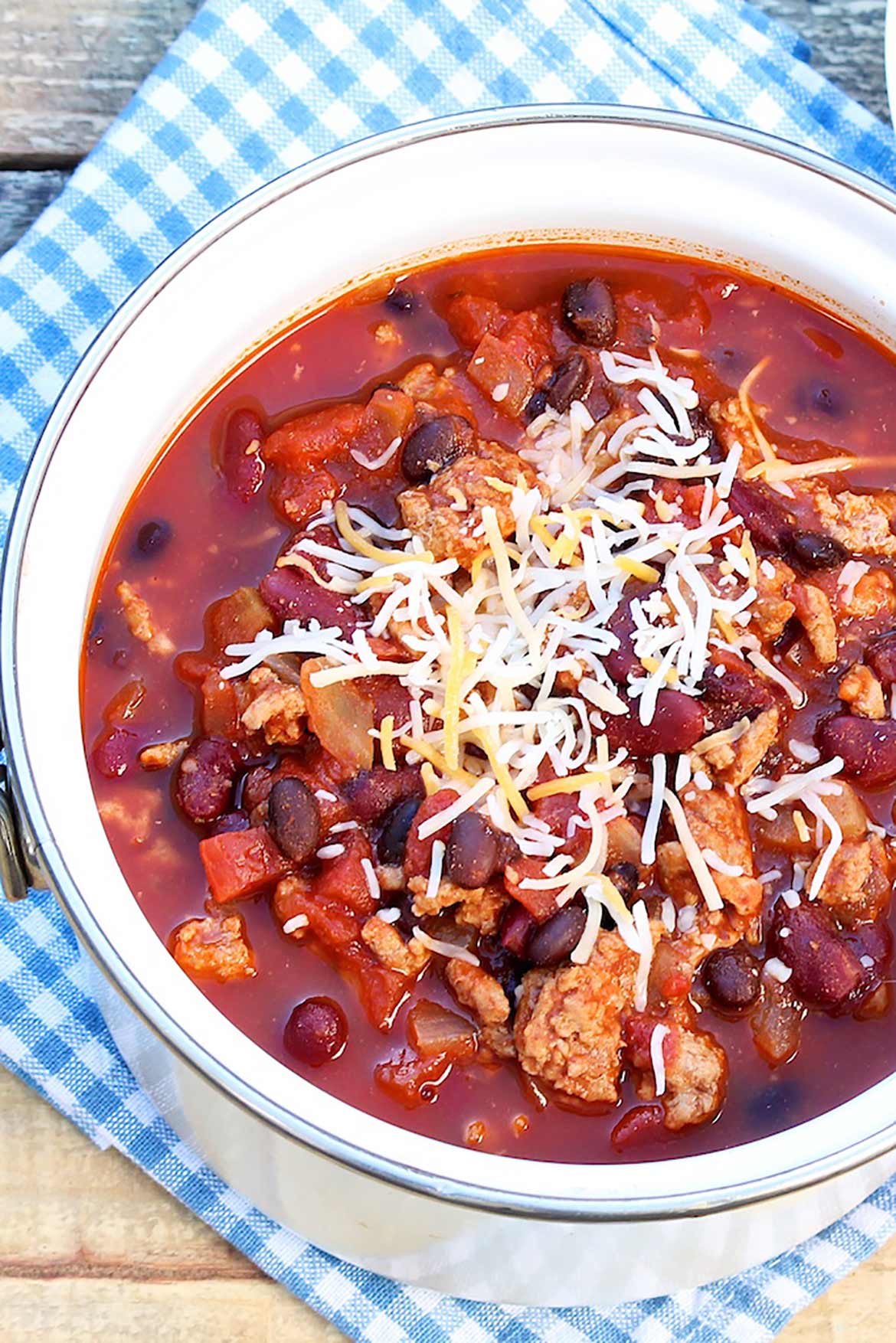 A great bowl of chili is just minutes away thanks to a handful of economical pantry ingredients. Top with a simple sprinkle of cheese or load it up with chopped avocado, crushed tortilla chips, minced onions, etc.