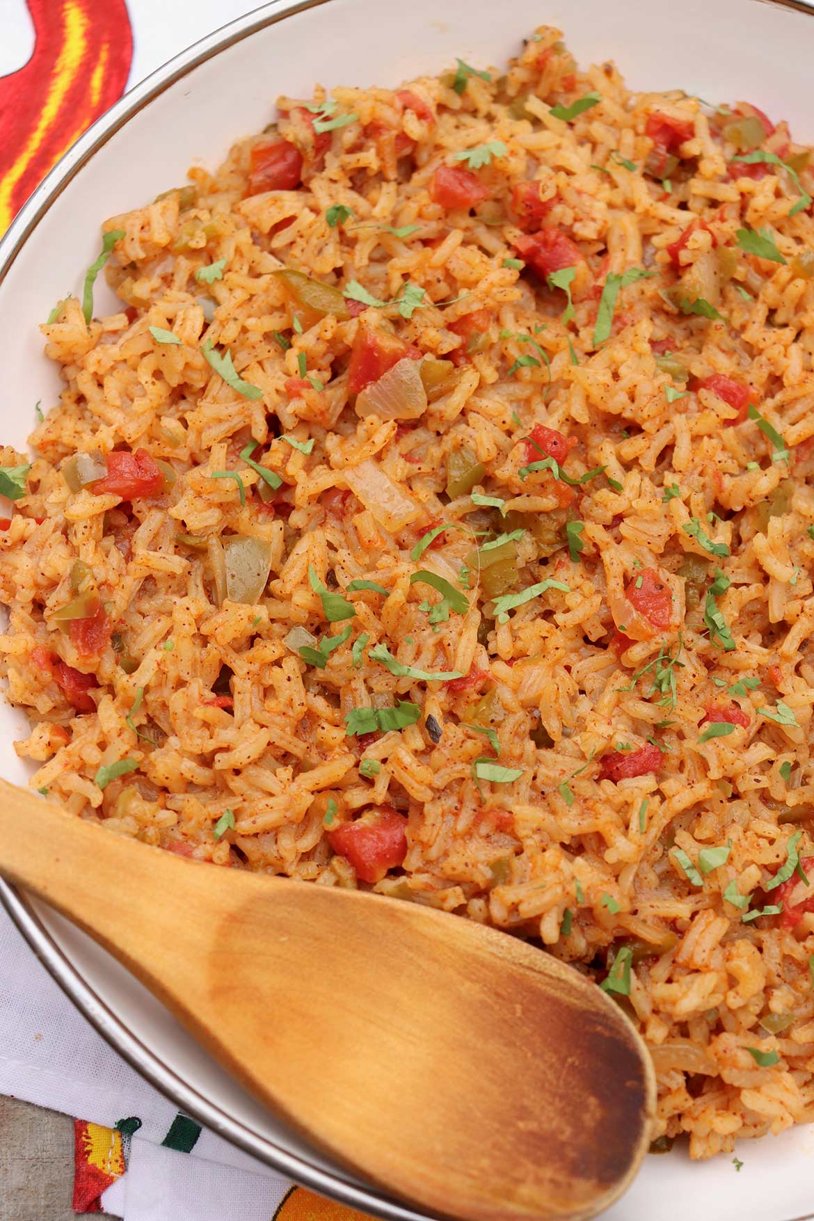 This versatile Spanish Rice recipe is bursting with flavor and can be prepped ahead for added ease at dinnertime!