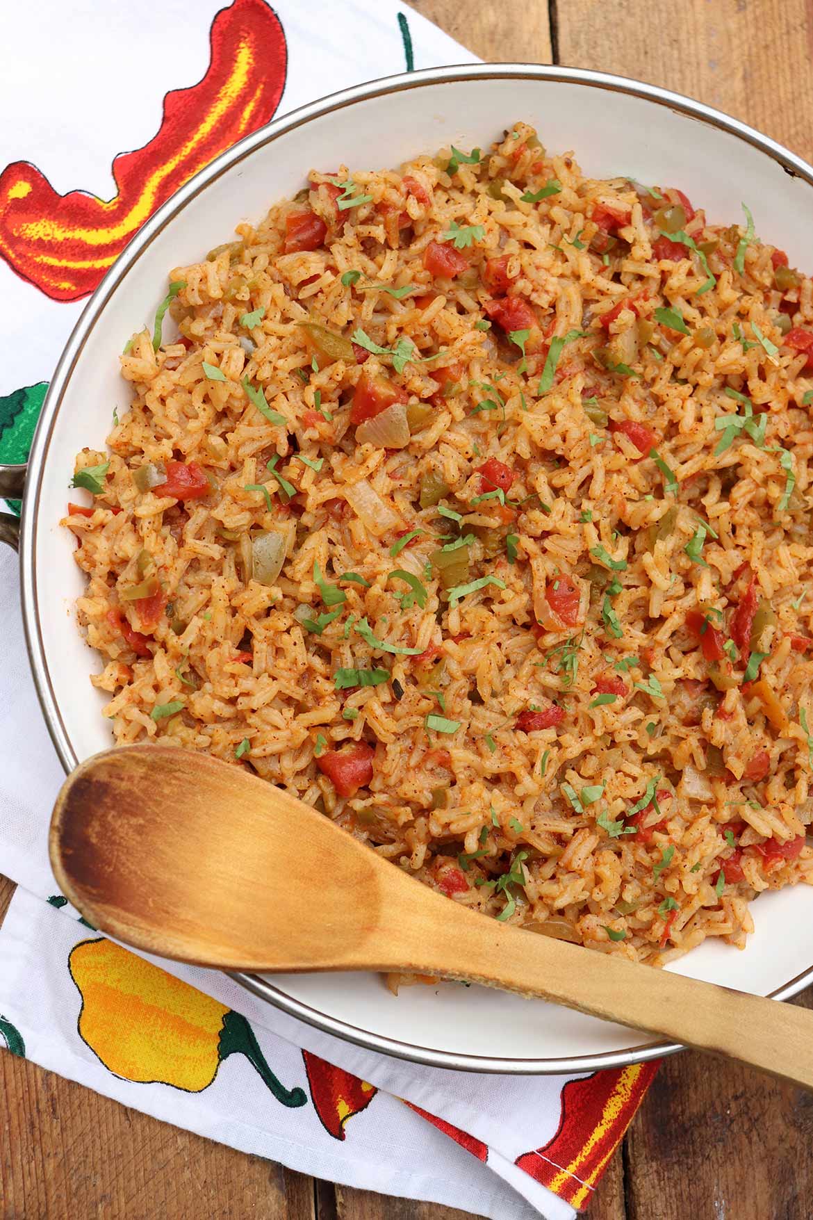 This versatile Spanish Rice recipe is bursting with flavor and can be prepped ahead for added ease at dinnertime!