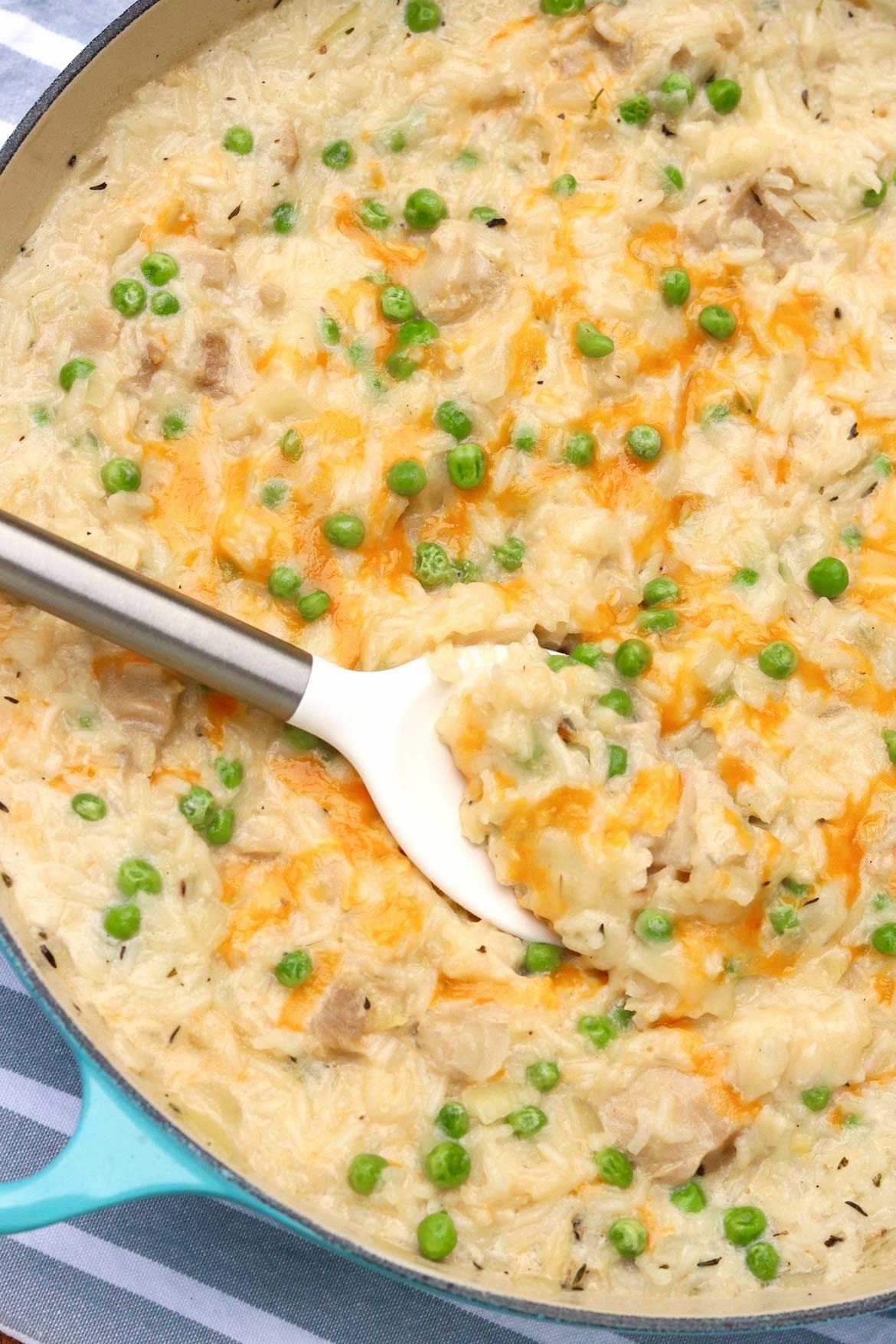 One Pot Stovetop Chicken and Rice is creamy comfort food that’s a breeze to whip up! For complementary color and flavor, serve with sliced tomatoes or a simple salad on the side.