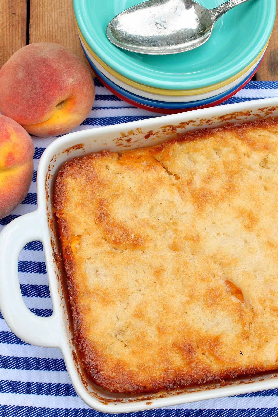Cuppa Cuppa Cuppa Cobbler -- sweet peaches, a novel yet easy preparation, and those crispy edges make this seasonal dessert a perennial favorite!