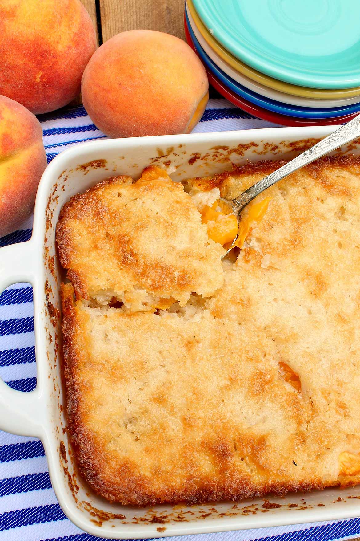 Cuppa Cuppa Cuppa Cobbler -- sweet peaches, a novel yet easy preparation, and those crispy edges make this seasonal dessert a perennial favorite!