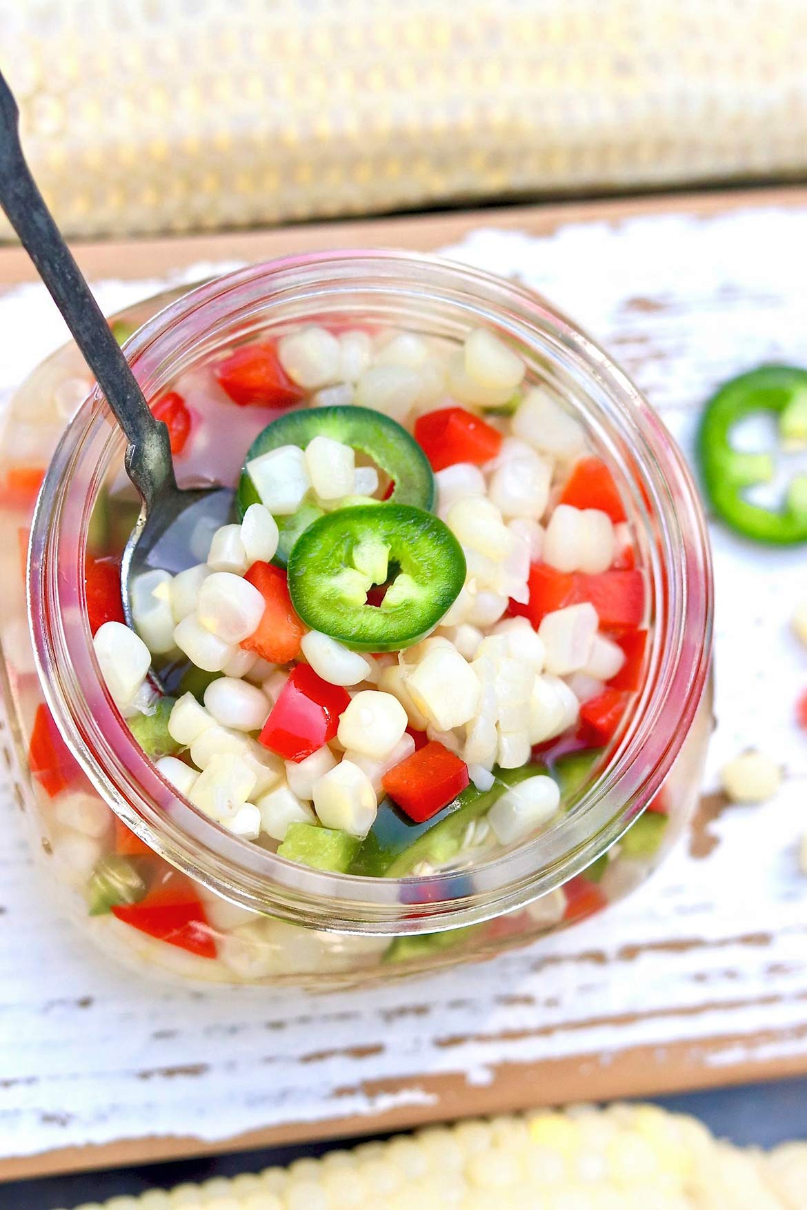 Quick Pickled Corn -- an easy-to-make condiment that will perk up burgers, tacos, and salads...and it tastes great by the spoonful, too!