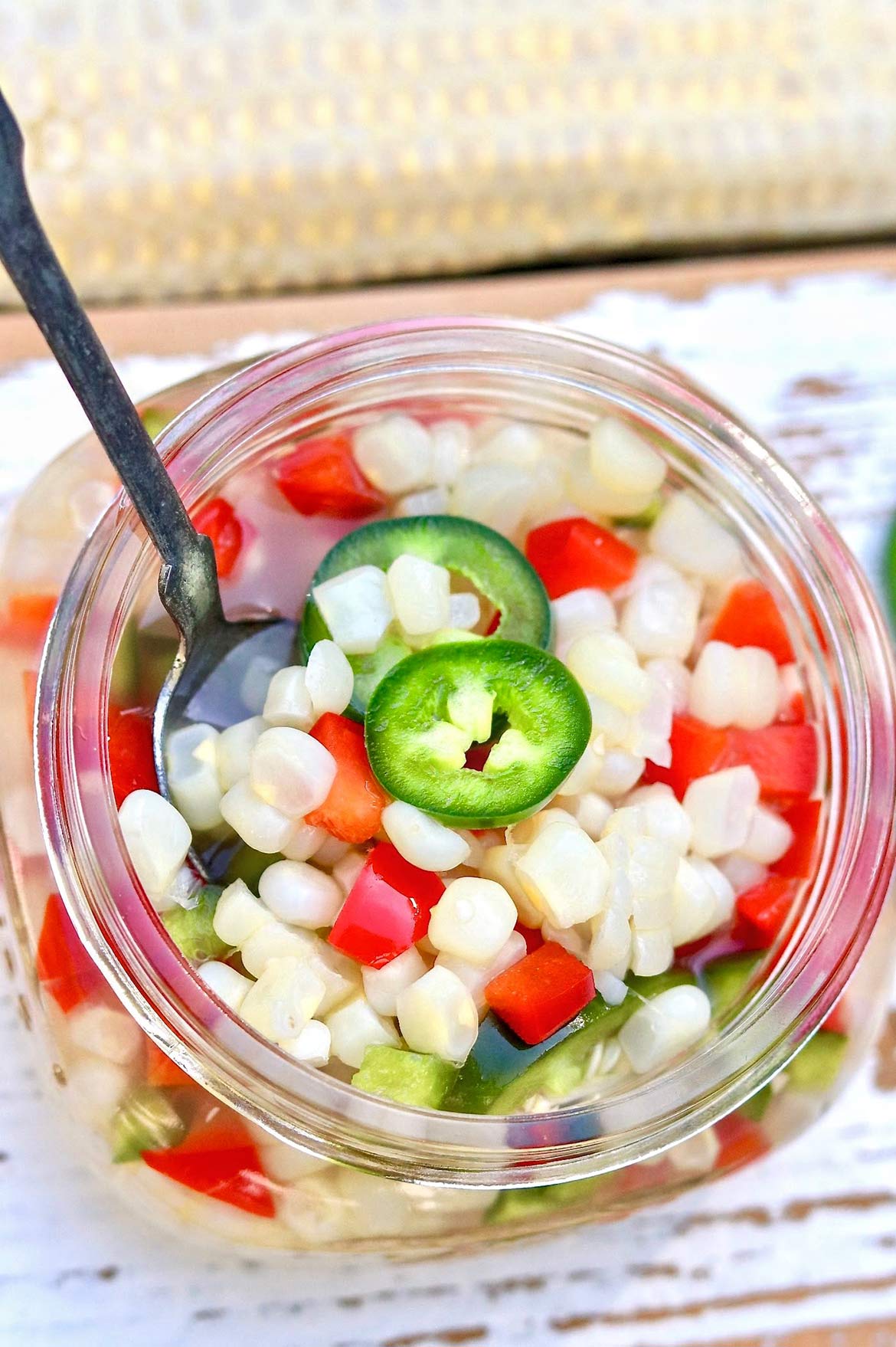 Quick Pickled Corn -- an easy-to-make condiment that will perk up burgers, tacos, and salads...and it tastes great by the spoonful, too!