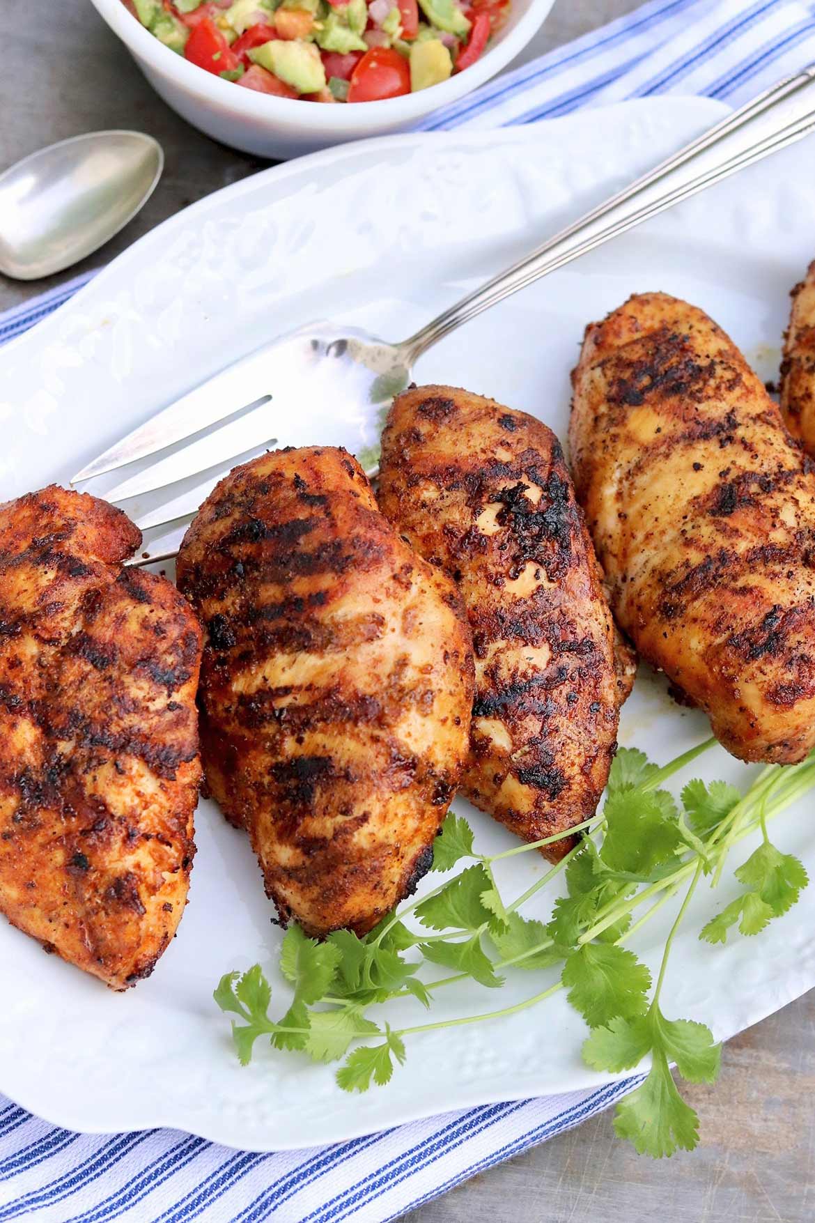 Sazón Grilled Chicken - This little spice packet (or the easy homemade option) adds incredible flavor when used as a rub for grilled chicken!