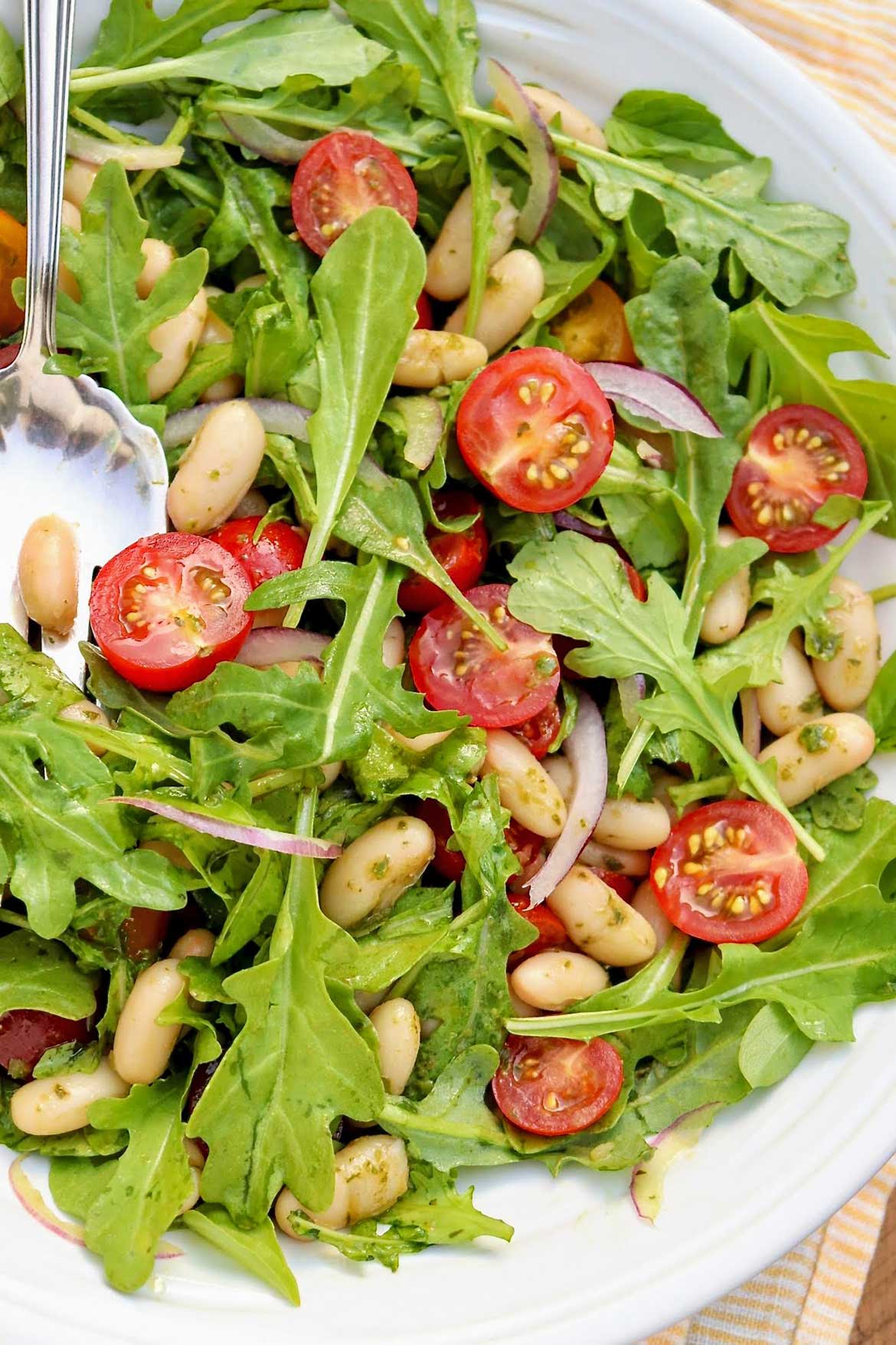 Tomato & White Bean Salad with Basil Vinaigrette — healthy, endlessly adaptable, and can be made in a flash with the easy basil vinaigrette recipe or your favorite pesto.