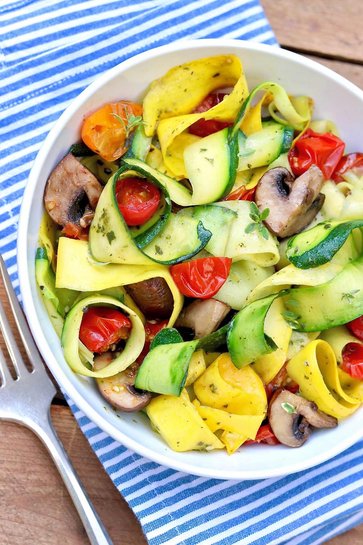 Zucchini Noodles Made Easy ~ This simplified method of creating zucchini noodles yields wide ribbons that require nothing more than a quick sear and a sprinkle of salt and pepper – yet they serve as a fine foundation for a plethora of other toppings, too.