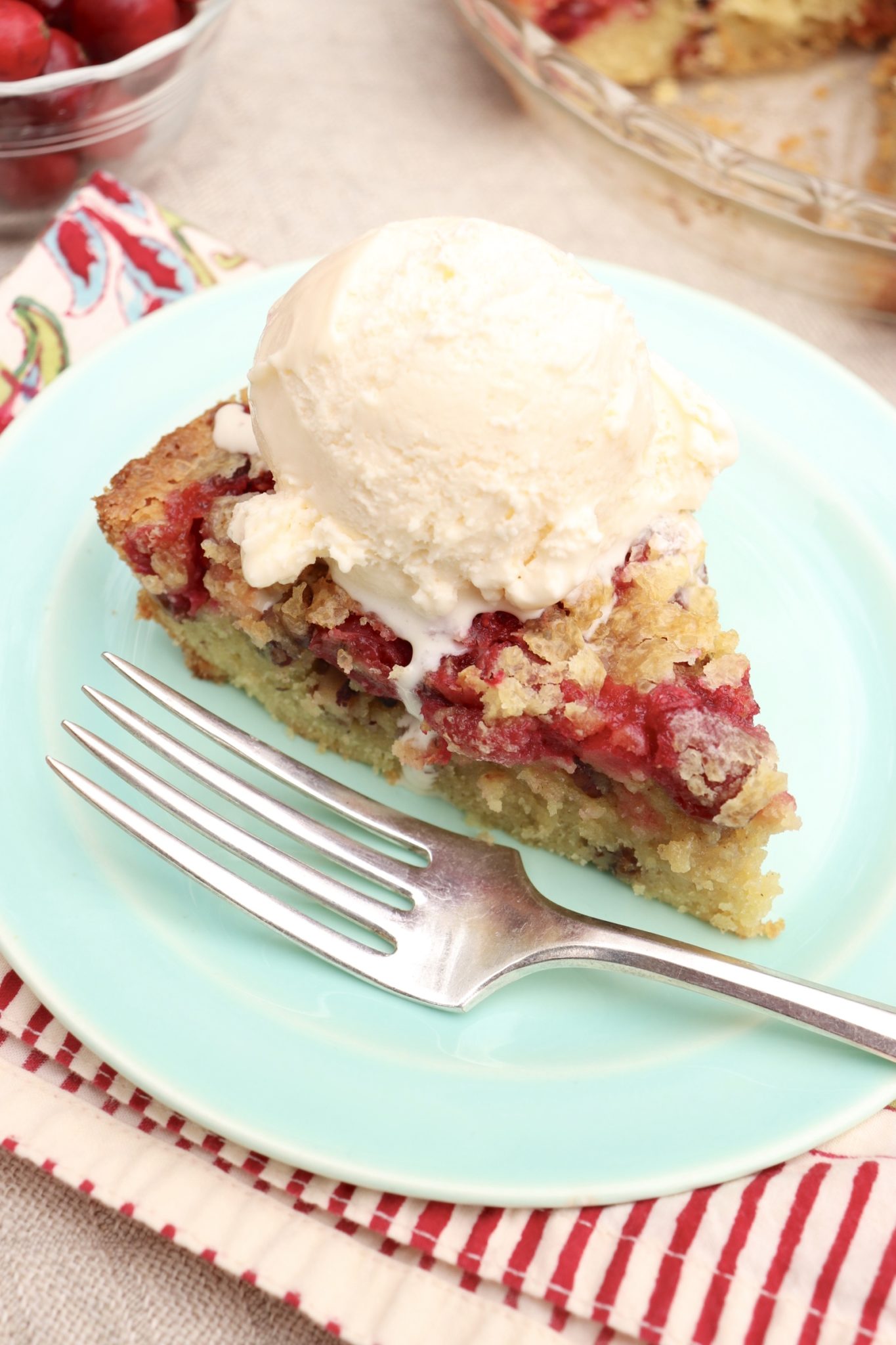 Crustless Cranberry Pie-festive, seasonal and so easy to make with pantry staples, this sweet-tart treat is fruit forward like a pie but somewhat cakier in texture.