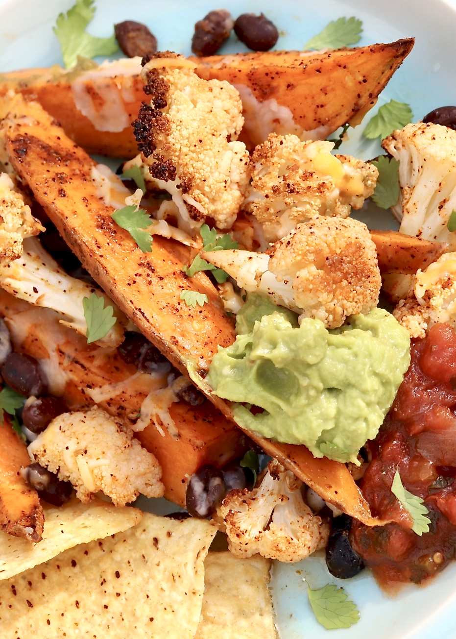 Roasted Veggie “Nachos” are a healthy, super satisfying spin on the typical appetizer that can be customized to taste and enjoyed as a filling, plant-based meal. Can be prepared on a single sheet pan, too!
