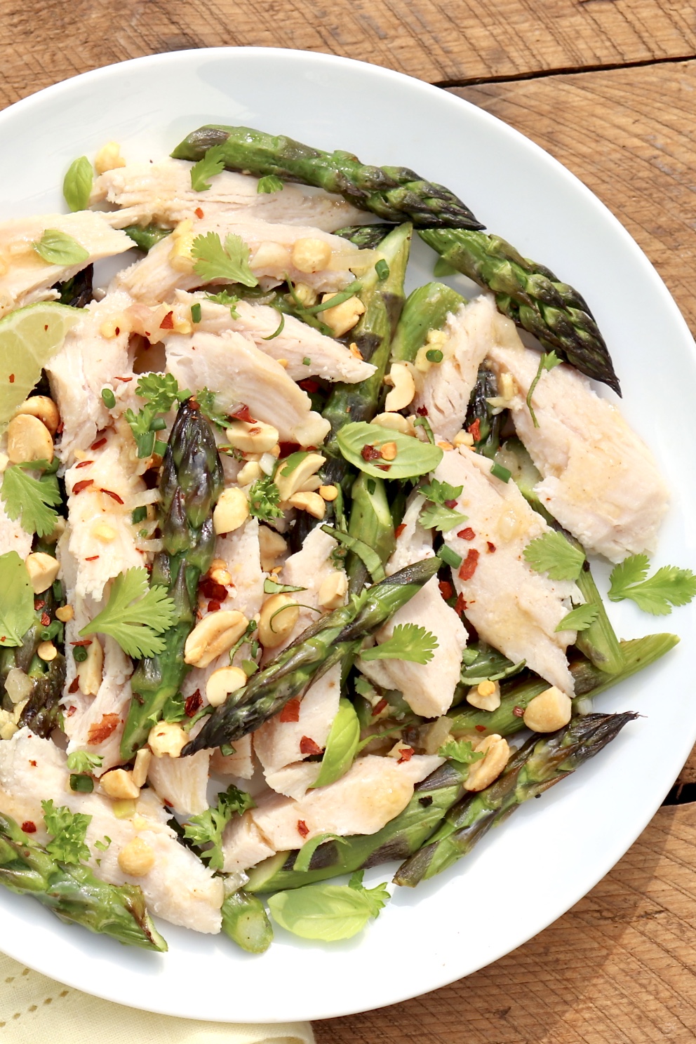 Asparagus & Chicken Salad With Sesame Ginger Dressing-A light yet filling spin on the usual chicken salad includes a hearty dose of vegetables and a versatile vinaigrette instead of mayo. Elegant and easy with prep-ahead options.