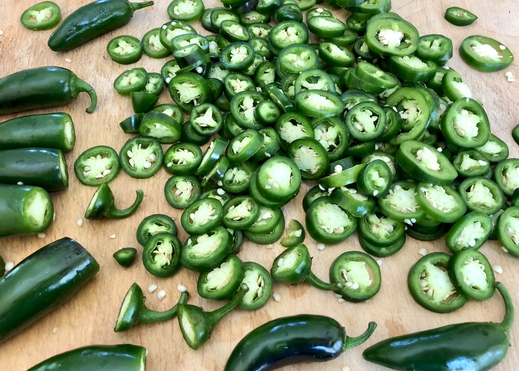 Candied Jalapeños (a.k.a. Cowboy Candy)-Sweet, spicy and oddly addictive, these pickled jalapeño rounds are a fun addition to your condiment collection and can be enjoyed in so many ways.