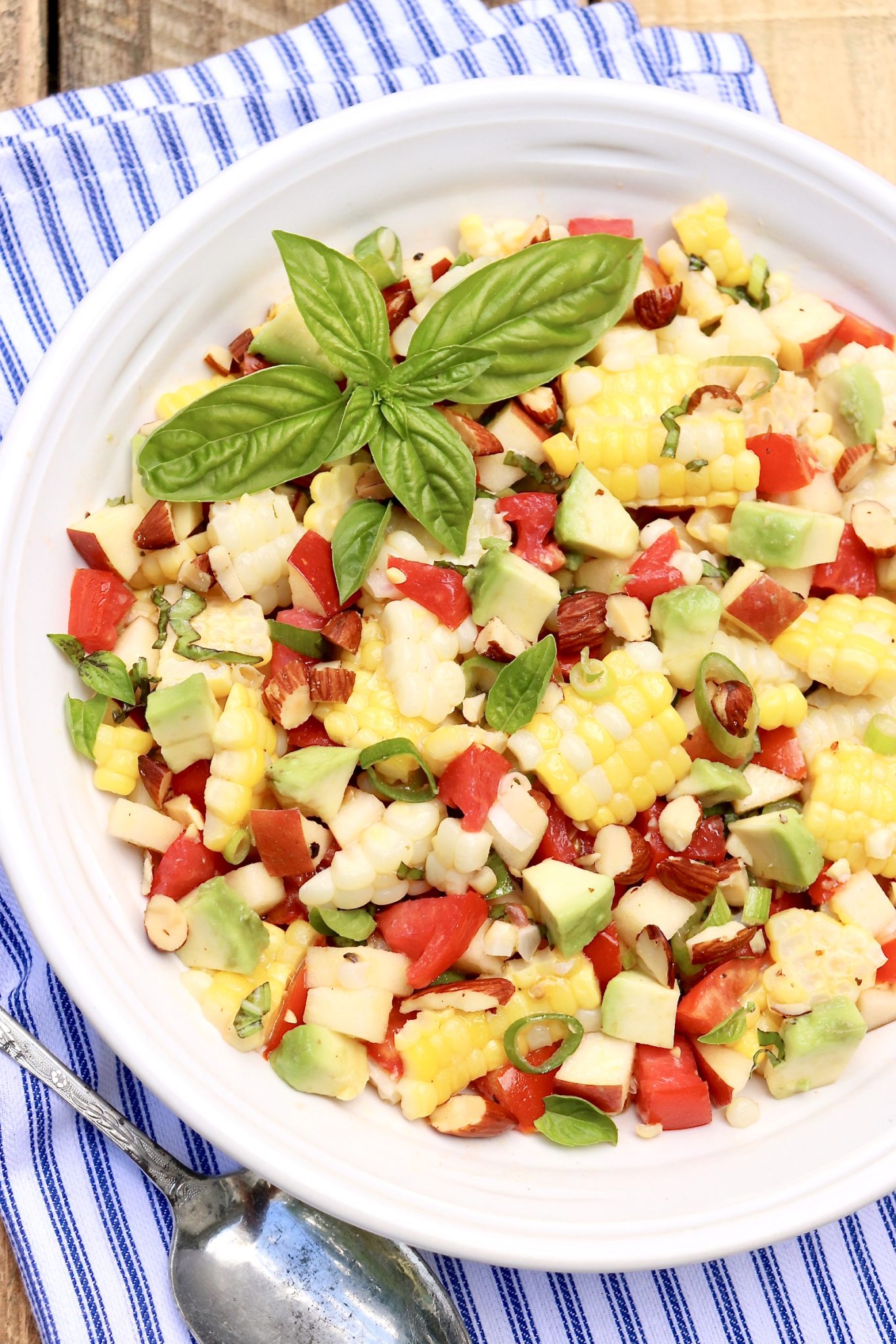NAPA SWEET CORN SALAD-An unexpected ingredient adds crisp crunch to a classic corn salad, and the easy vinaigrette pulls it all together. Perfect for summer and fall meals!