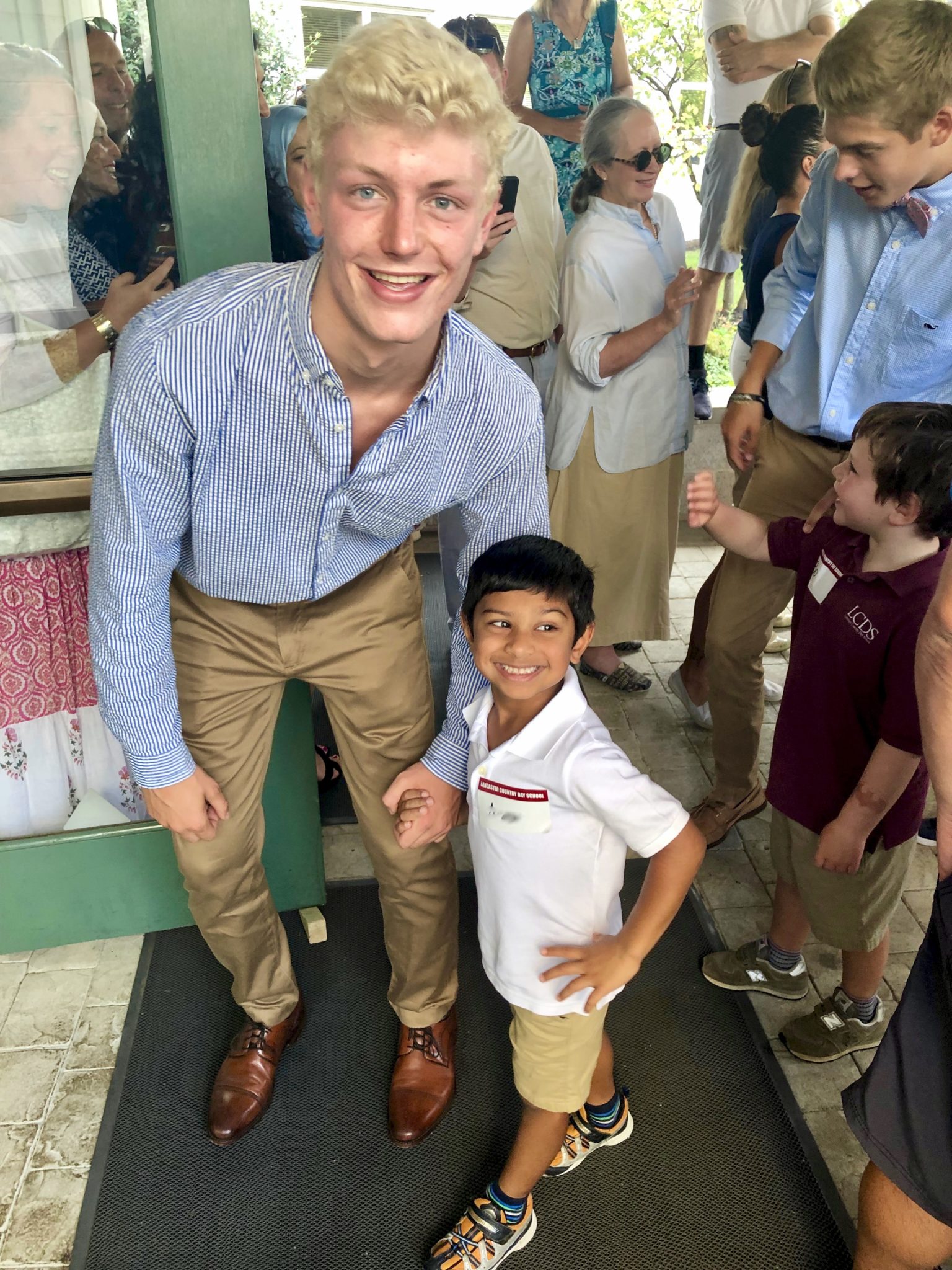 First day, senior year - Christian with his kindergarten buddy