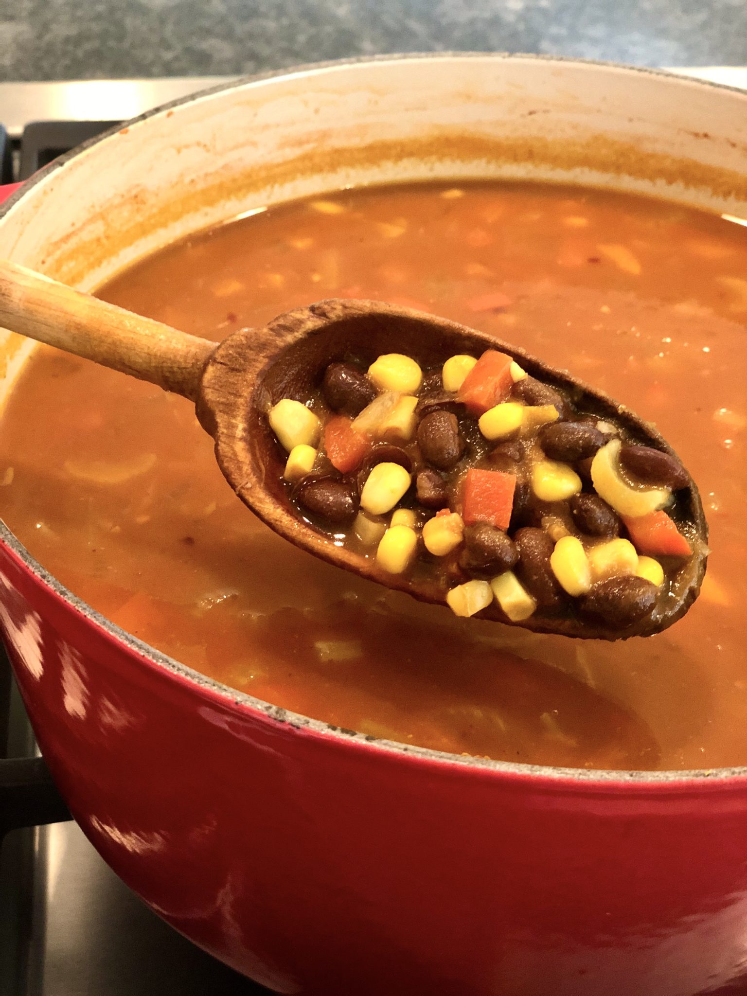 PUMPKIN AND BLACK BEAN SOUP - a super-healthy, stick-to-your-ribs, vegan soup that's easy to customize. The big-batch recipe only gets better with age, making leftovers a real treat!