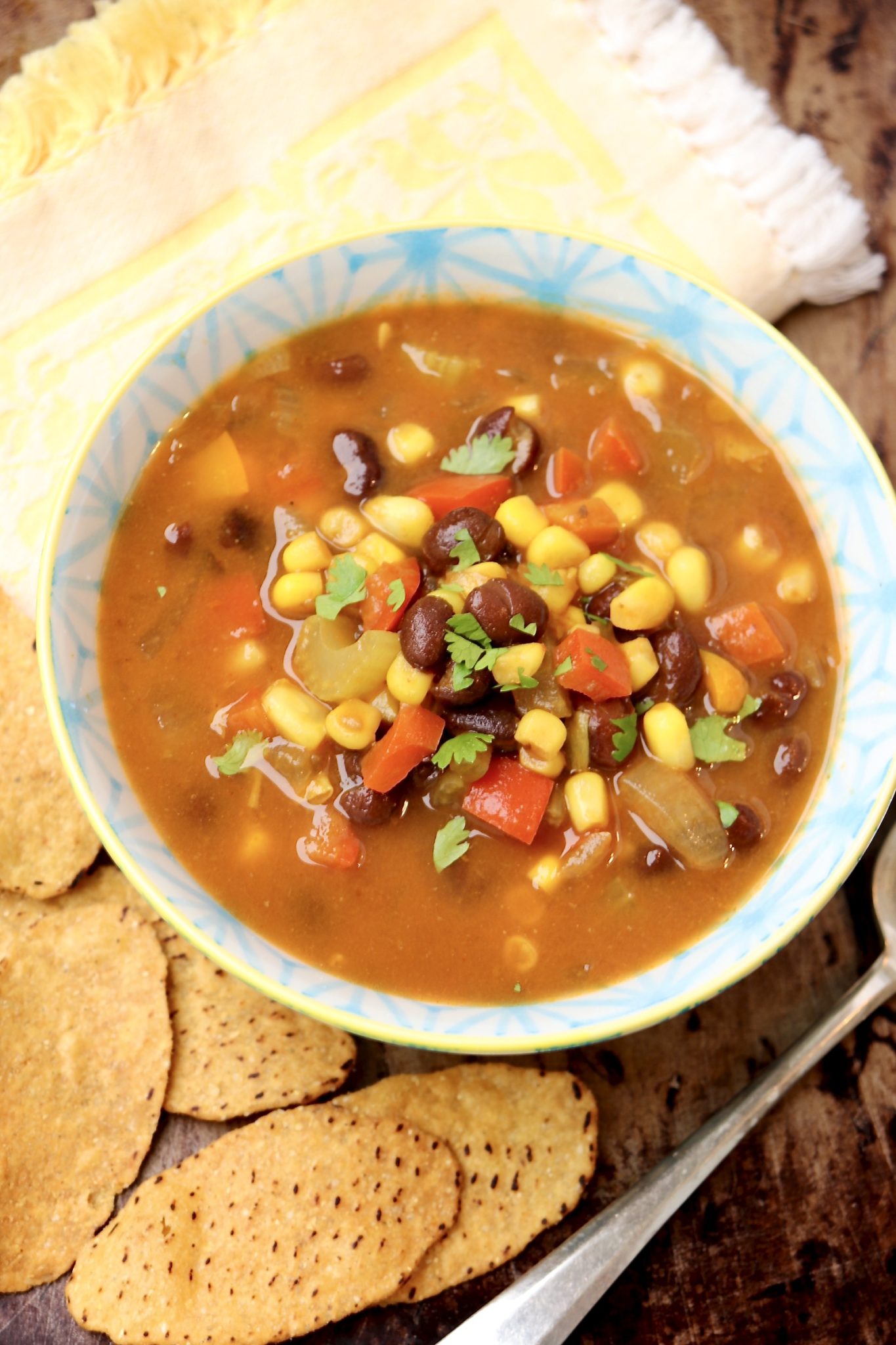 PUMPKIN AND BLACK BEAN SOUP - a super-healthy, stick-to-your-ribs, vegan soup that's easy to customize. The big-batch recipe only gets better with age, making leftovers a real treat!