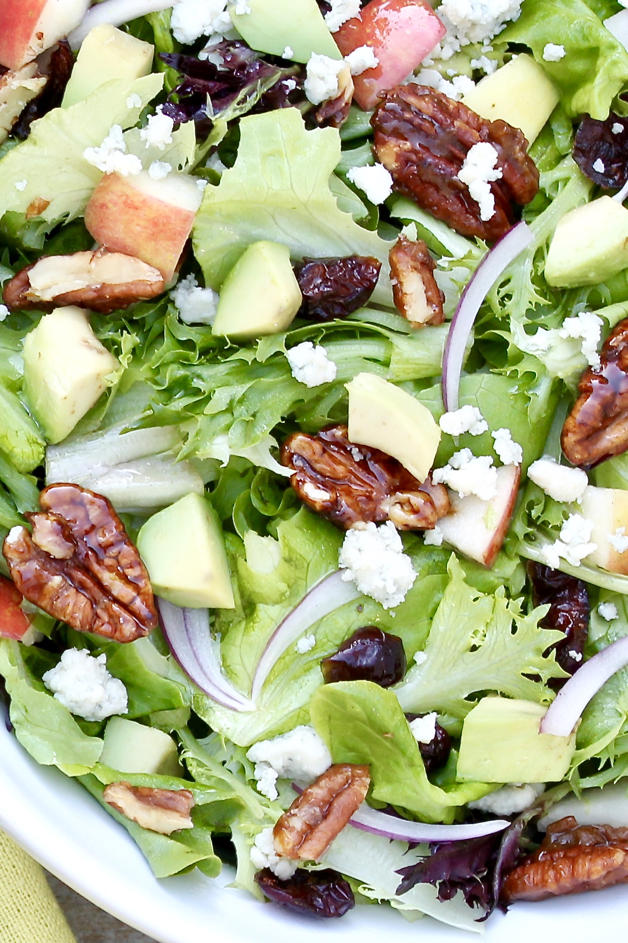 Roquefort Pear or Apple Salad - This is the best tossed salad I've ever eaten and I make it all the time. It's sweet and tangy from the fruit, sharp and salty from the blue cheese, and delightfully crunchy from the caramelized pecans. The easy vinaigrette pulls it all together and can be kept on hand for healthy, satisfying salads at a moment's notice. The recipe is a go-to on busy weeknights yet 100% worthy of a holiday meal.