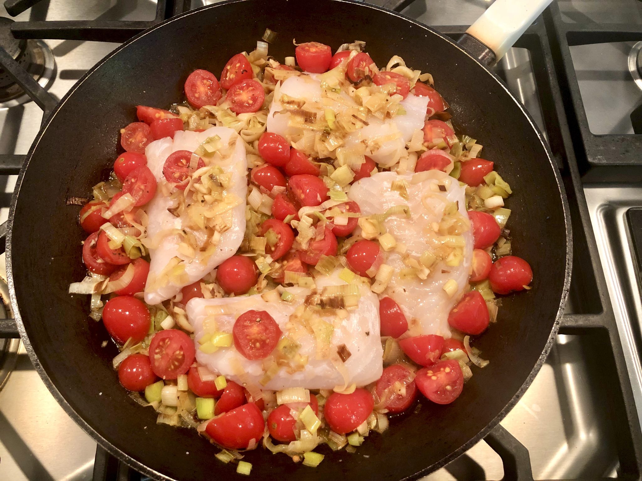 BRAISED COD with TOMATOES and LEEKS - Once the veggies are chopped, this one-pan fish dish cooks in 15 minutes and is loaded with flavor. Elegant enough for company yet simple enough for busy weeknights, it's also a delicious way to increase your intake of heart-healthy fish.