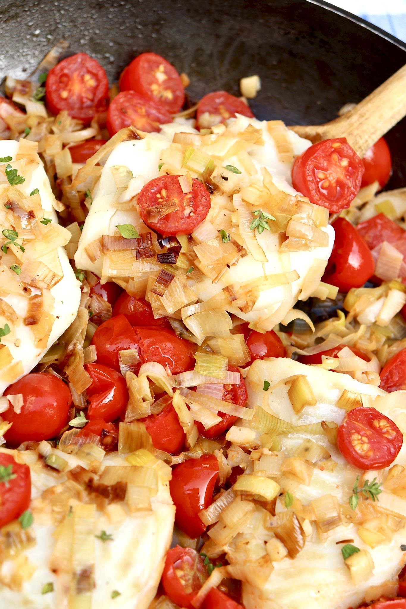 BRAISED COD with TOMATOES and LEEKS - Once the veggies are chopped, this one-pan fish dish cooks in 15 minutes and is loaded with flavor. Elegant enough for company yet simple enough for busy weeknights, it's also a delicious way to increase your intake of heart-healthy fish.