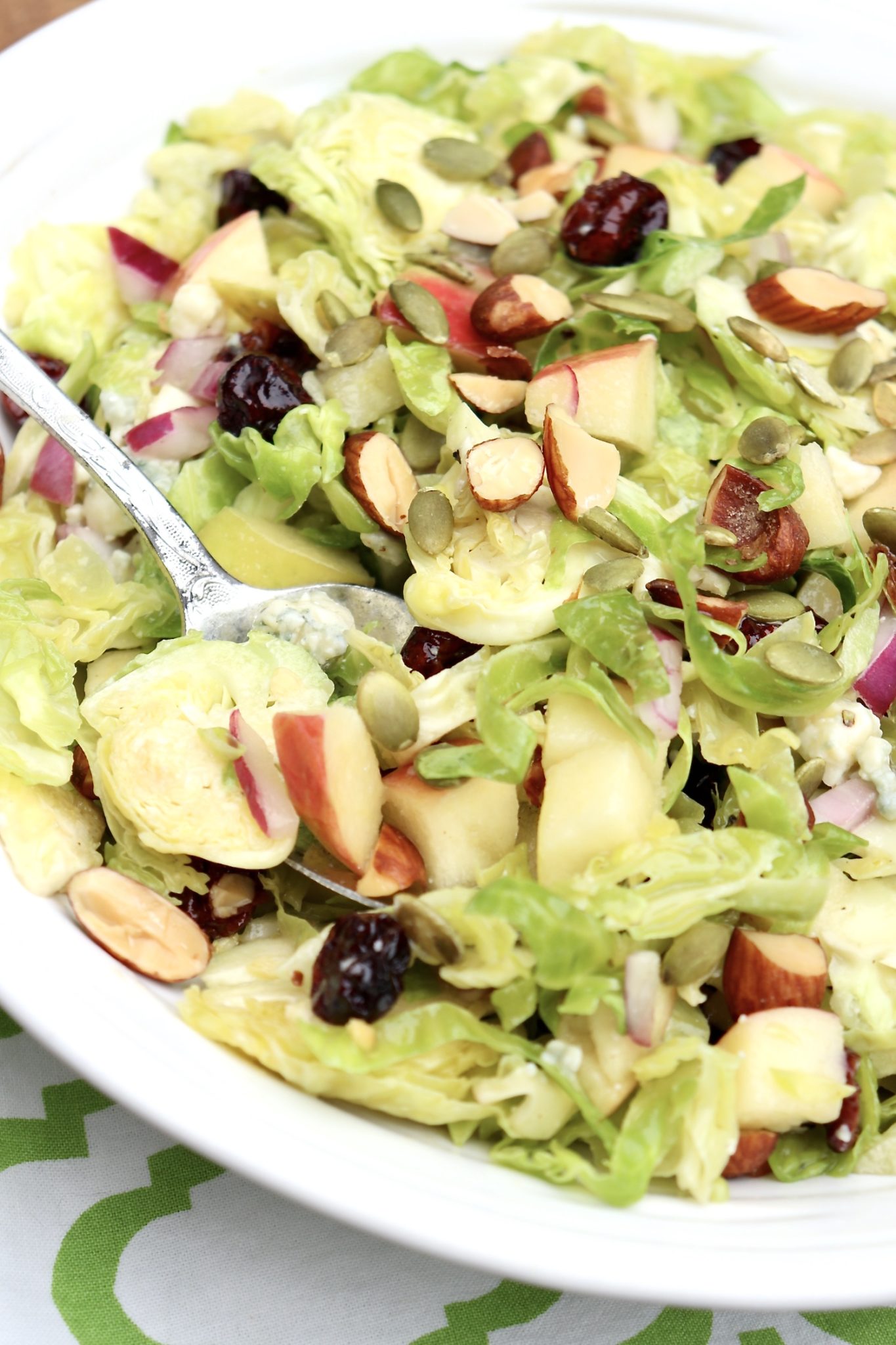 FAVORITE BRUSSELS SPROUTS SALAD - A go-to salad for busy nights, parties, potlucks and 100% worthy of a holiday table. This super-satisfying salad can be made in advance and you'll want to use the dressing over and over again.