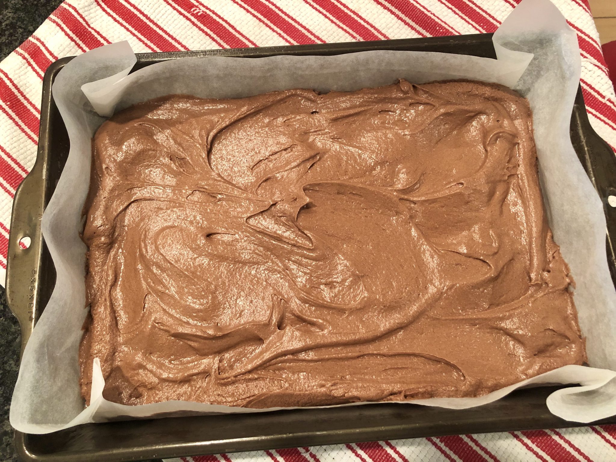 Chewy edges yield to delightfully creamy insides and a "just right" chocolate flavor in these Nutella-infused brownies...and the recipe fills a 9x13 pan!