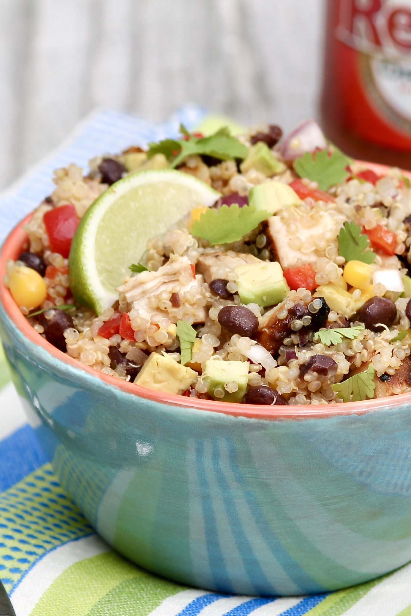 This healthy bowl of deliciousness happens when you combine several proteins, a whole grain, and lots of colorful veggies and then drizzle with a simple vinaigrette!
