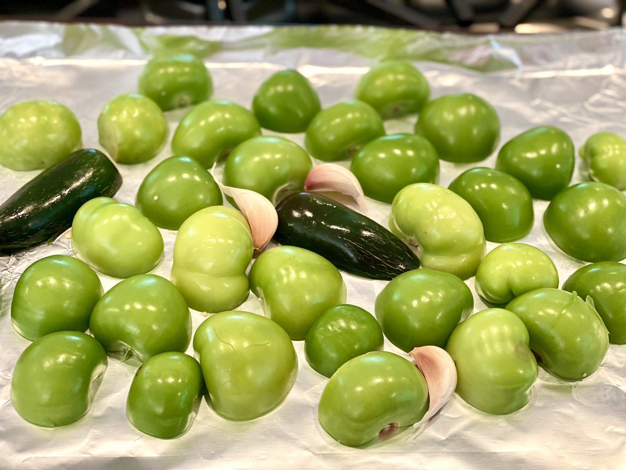 A quick broil brings out the flavor of tomatillos in this easy salsa that can be used just like its red counterpart. Think grilled meats, eggs, burgers, grain bowls, and anything Tex-Mex!
