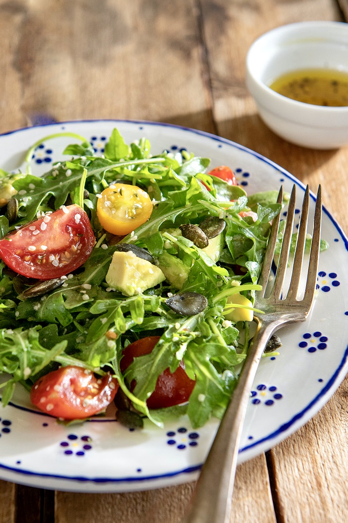 The simplest of vinaigrettes provides exceptional flavor in this crunchy, creamy, peppery, nutrient-dense salad that is so much more than the sum of its parts. The addition of your favorite protein will make it a complete meal.
