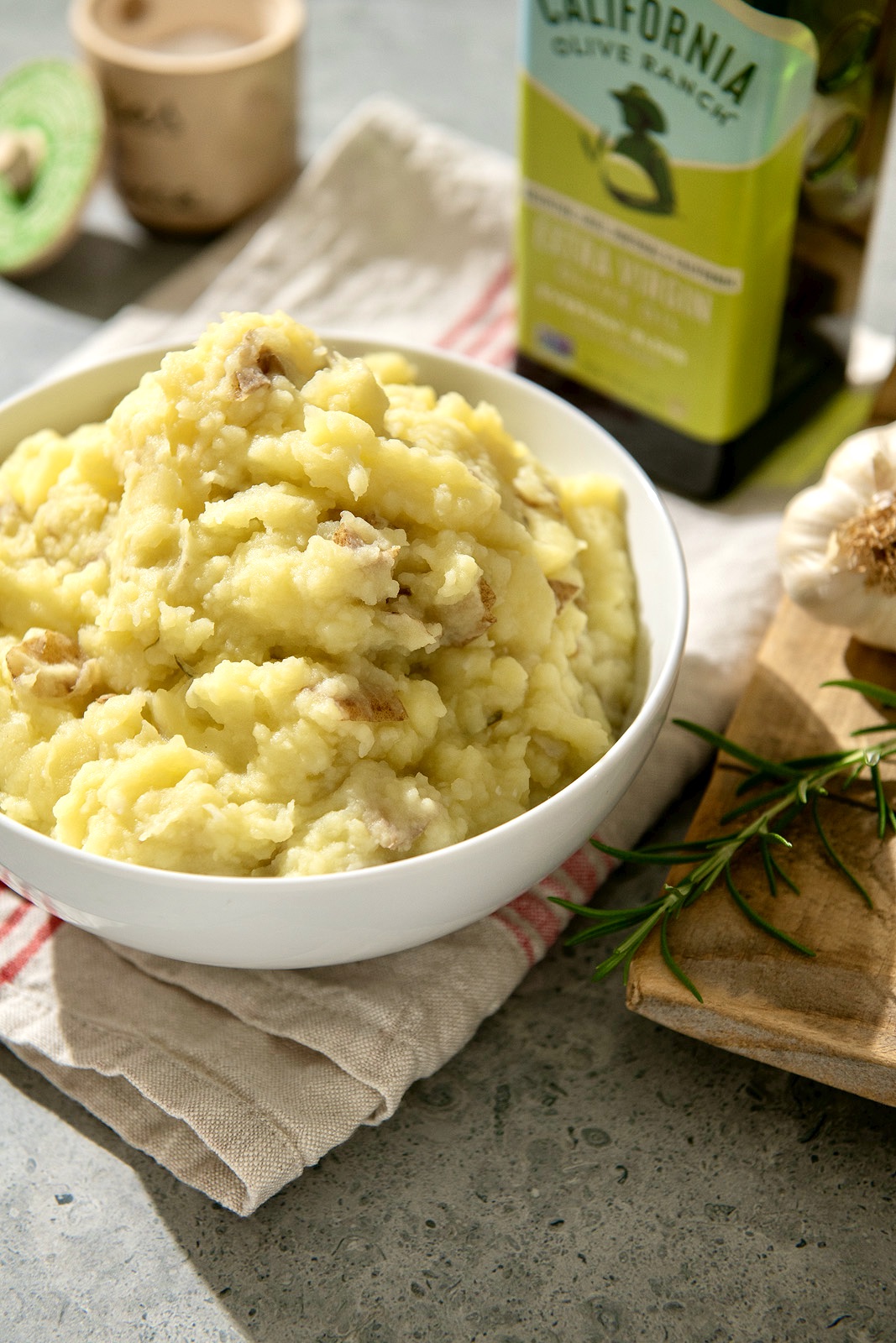 Light and creamy mashed potatoes can be dairy-free, fuss-free, and utterly delicious. Add a sprig of fresh rosemary for a little something extra!