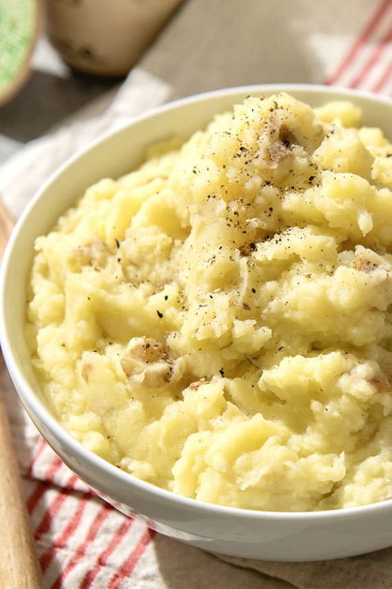 Light and creamy mashed potatoes can be dairy-free, fuss-free, and utterly delicious. Add a sprig of fresh rosemary for a little something extra!