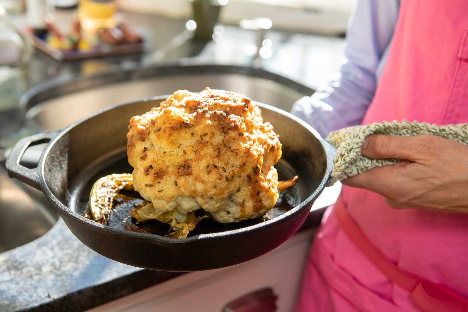A whole roasted head of cauliflower is delicious AND impressive. It can also be easy and relatively quick thanks to a helpful shortcut!