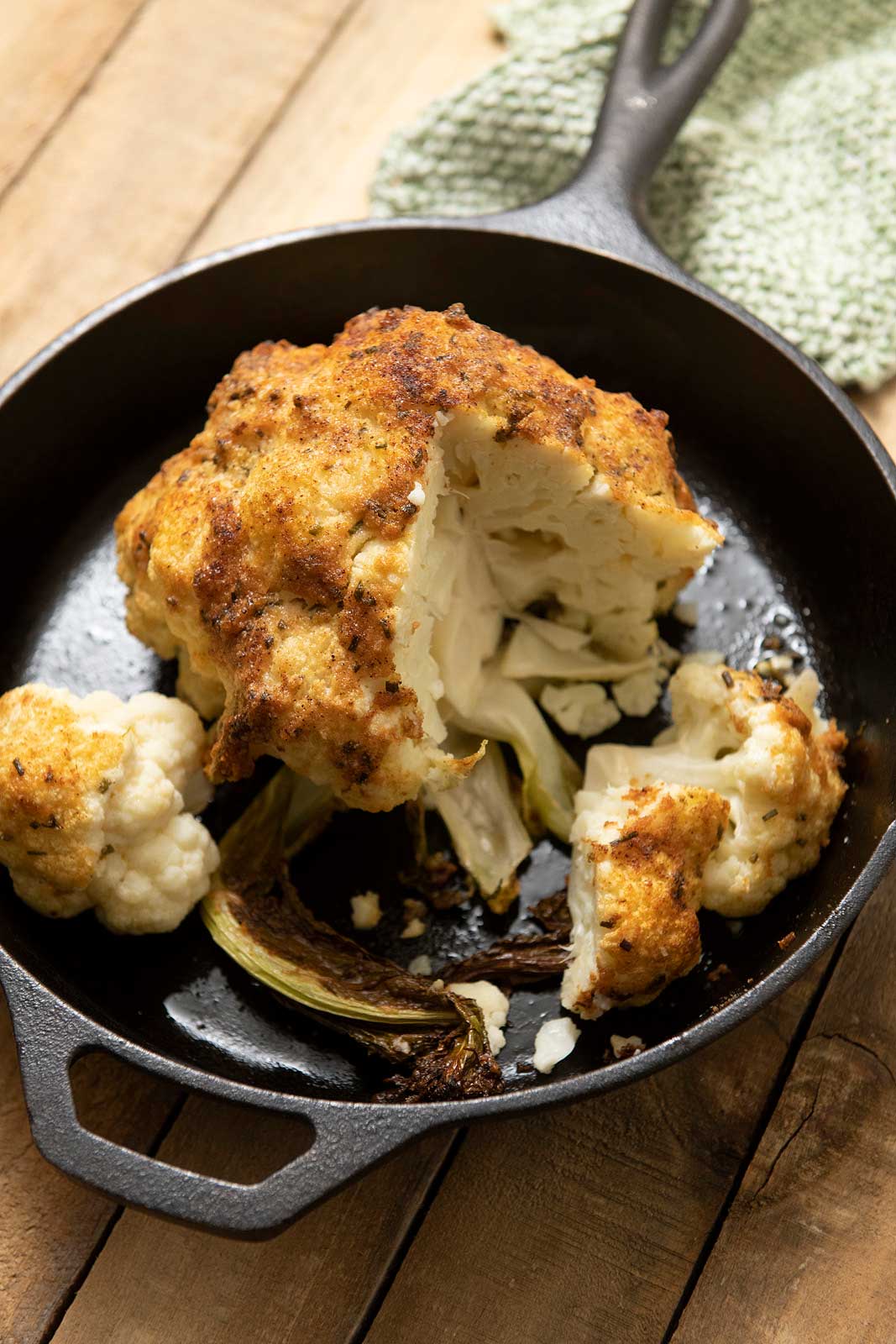 A whole roasted head of cauliflower is delicious AND impressive. It can also be easy and relatively quick thanks to a helpful shortcut!