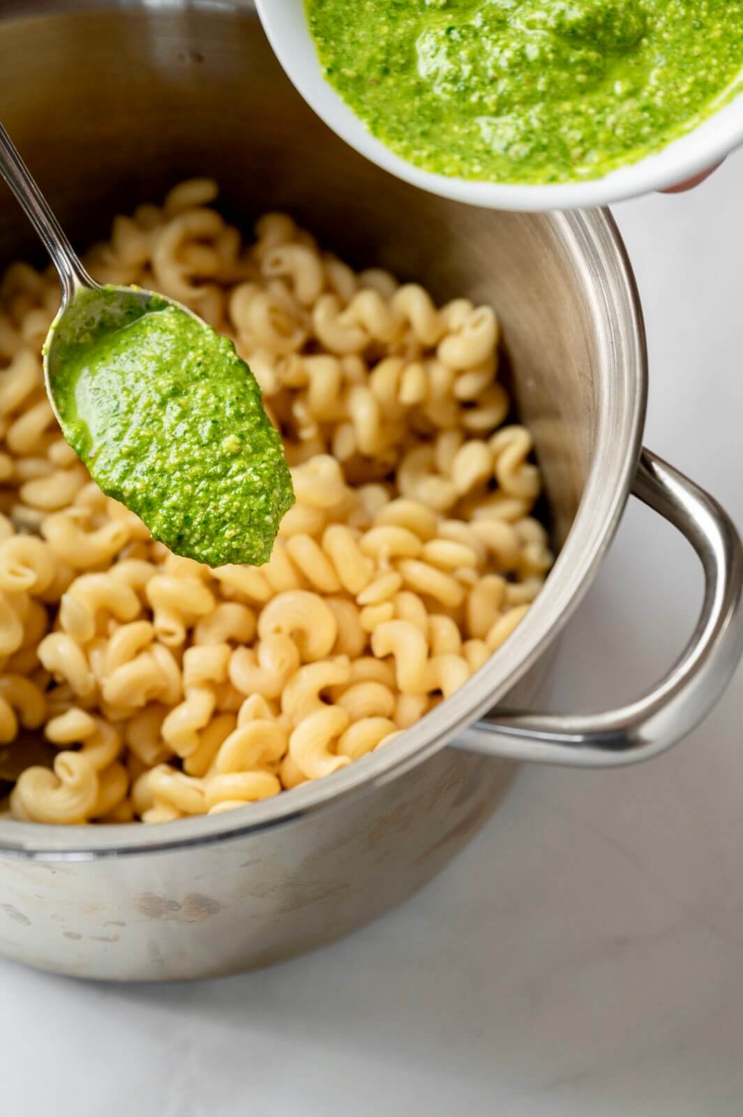 Easy, accessible, and endlessly versatile, this flavorful pesto is especially ideal when fresh herbs aren't available. Perfect for adding flavor to pasta, pizza and flatbread, sauces, sandwiches, and so much more, the simple recipe can be customized with a variety of nuts, seeds, and cheeses. Plus it maintains its vibrant green color and freezes well!