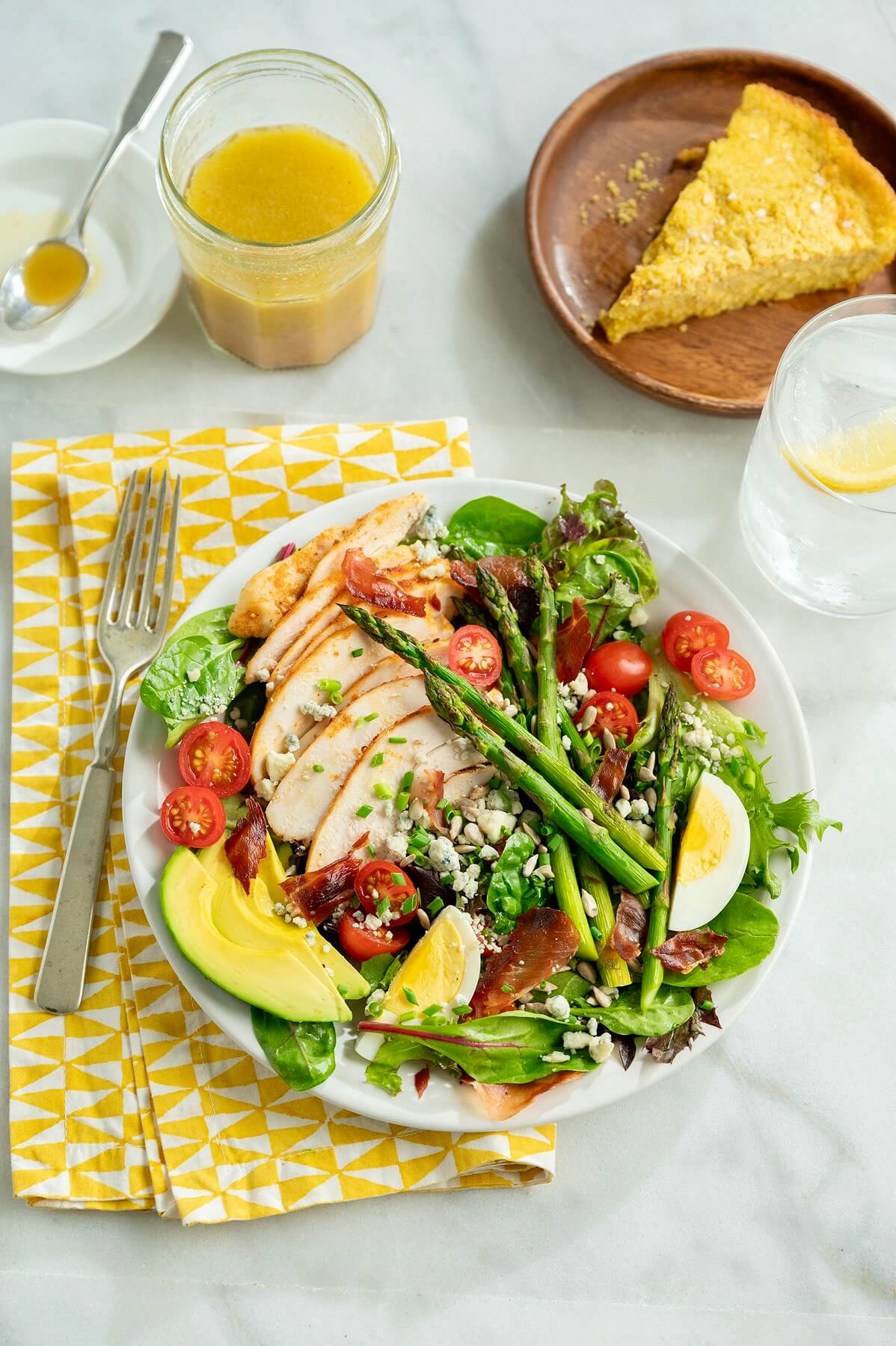 Sure, you can make a regular Cobb salad, and it will taste great. But adding asparagus ramps up the color, nutritional value, and seasonal appeal. If you don’t usually have salads for dinner, this satisfying plateful might win you over. (Bonus recipes included!)