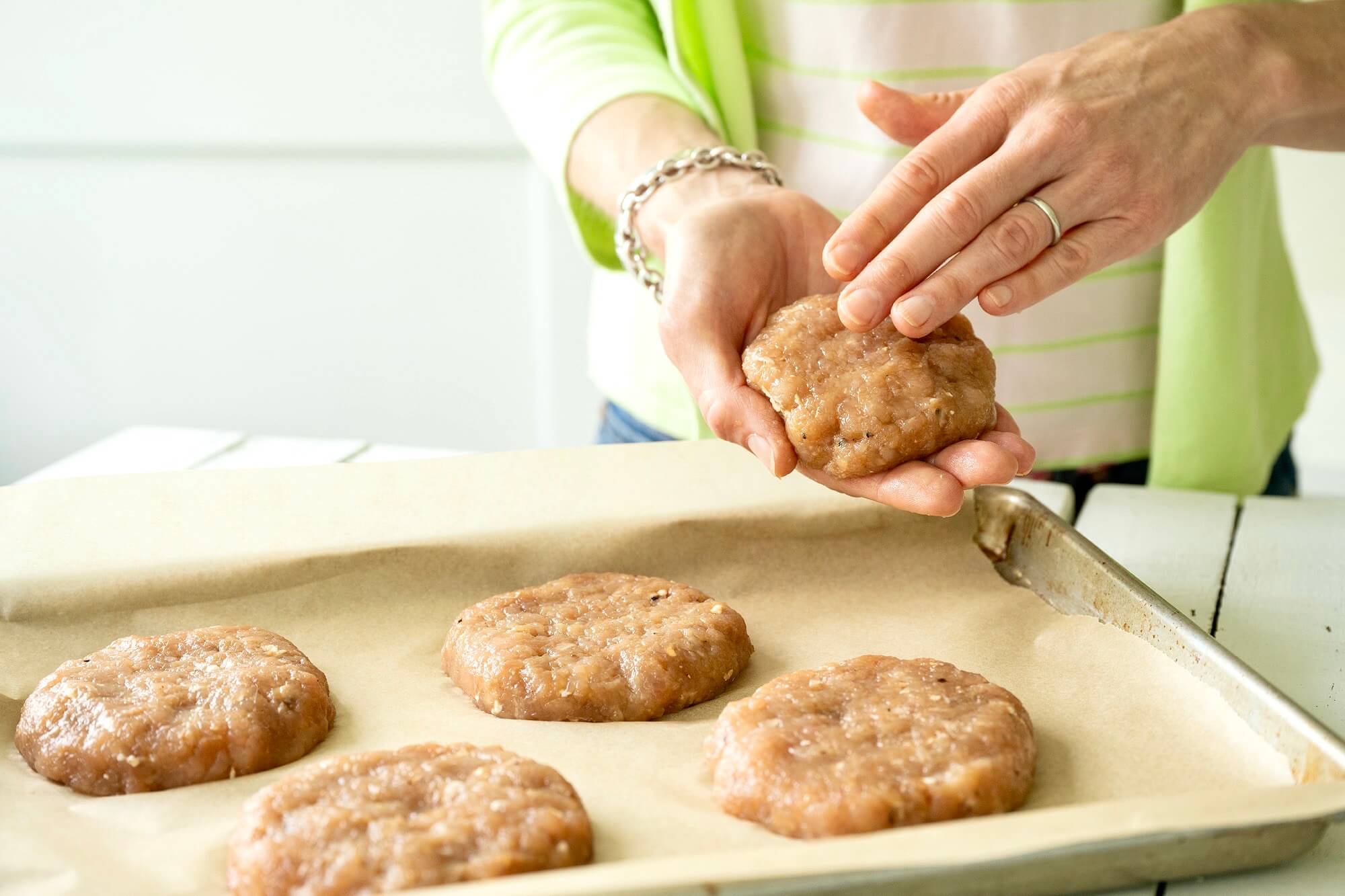 Tender, juicy, flavor-packed turkey burgers are possible with lean breast meat thanks to a few simple additions. A go-to weeknight meal and worthy of a weekend barbecue!