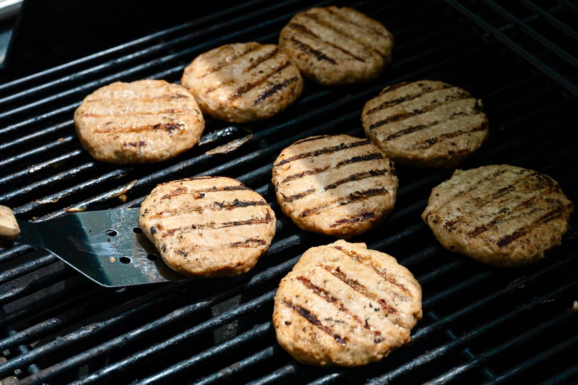 Tender, juicy, flavor-packed turkey burgers are possible with lean breast meat thanks to a few simple additions. A go-to weeknight meal and worthy of a weekend barbecue!