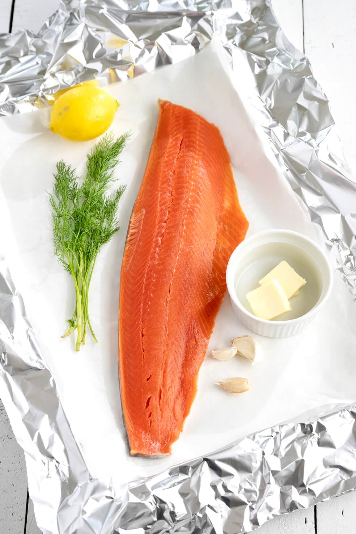 A short list of everyday ingredients makes this easy salmon recipe shine. The simple foil packet locks in flavor and moisture--and makes cleanup a snap!