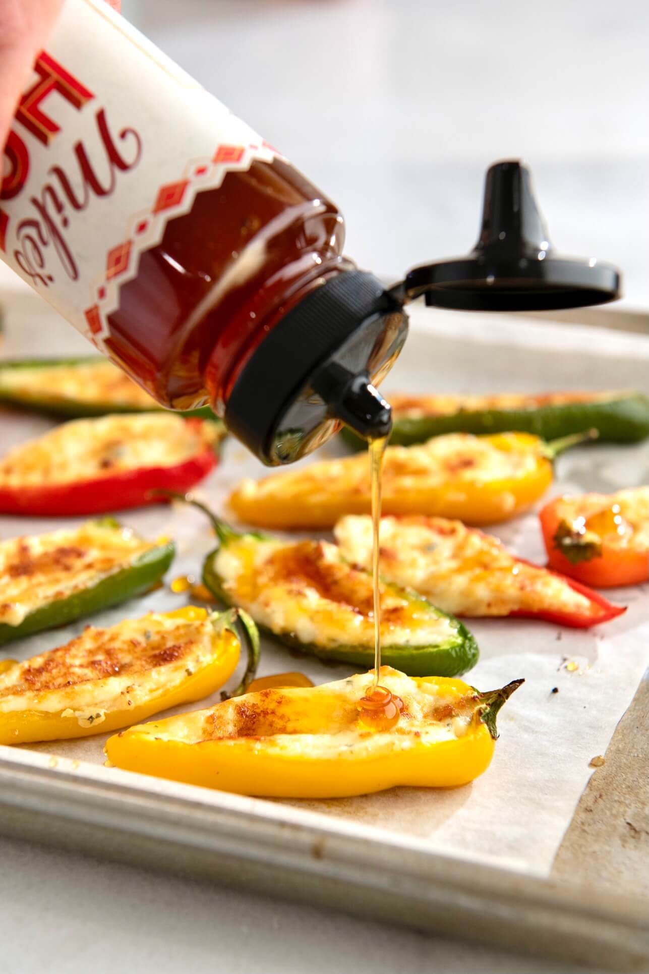 A flavor-packed appetizer that can also be served as a tasty side dish, these 3-ingredient bites take minutes to assemble before baking to golden, cheesy perfection. An optional fourth ingredient offers a spicy-sweet variation!