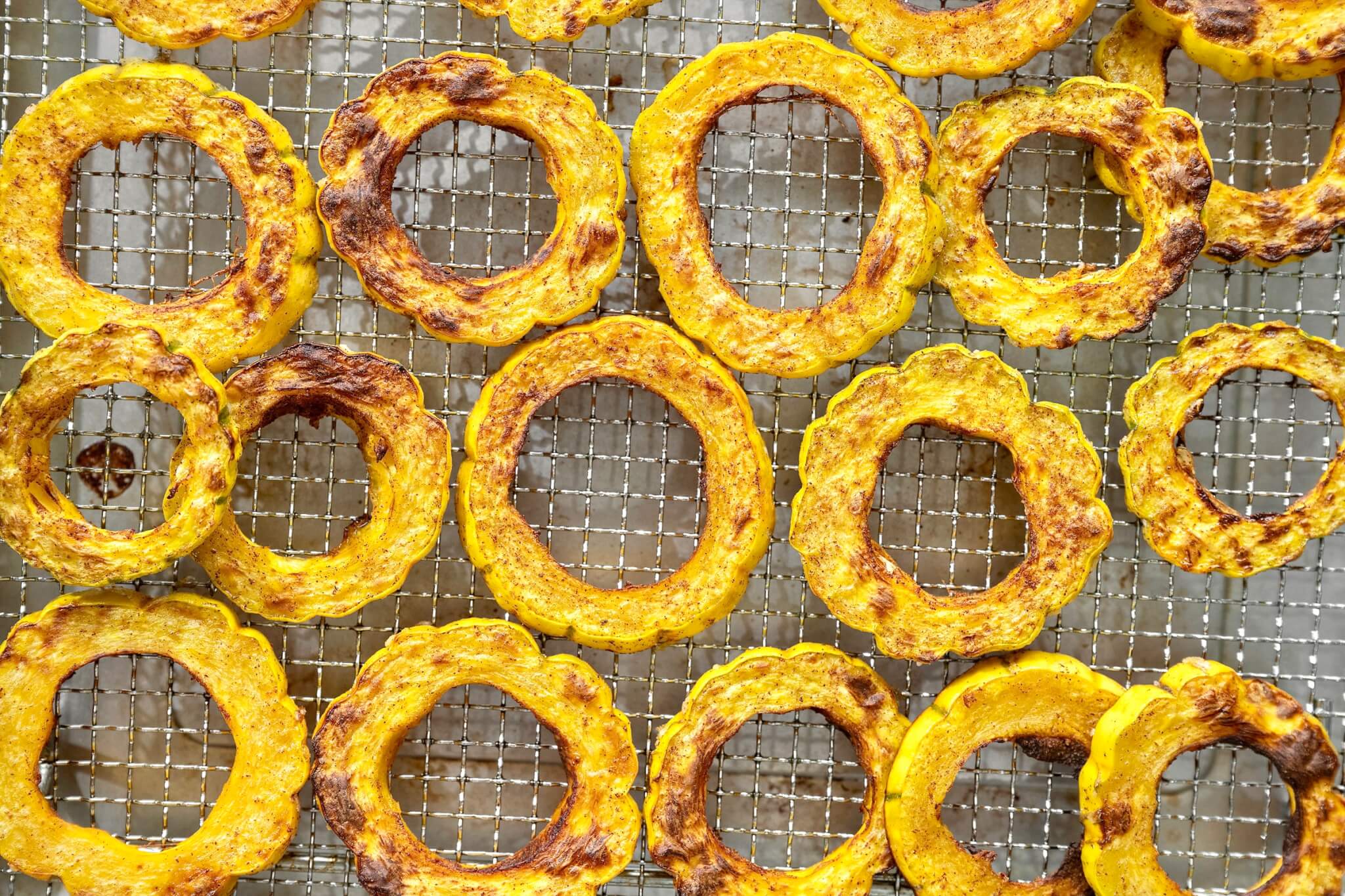 Warm spices add seasonal appeal to this easy side dish that quickly cooks to golden perfection in the oven or air fryer. Feel free to mix things up with a different variety of winter squash (or sweet potatoes) and a short list of optional toppings if inclined.
