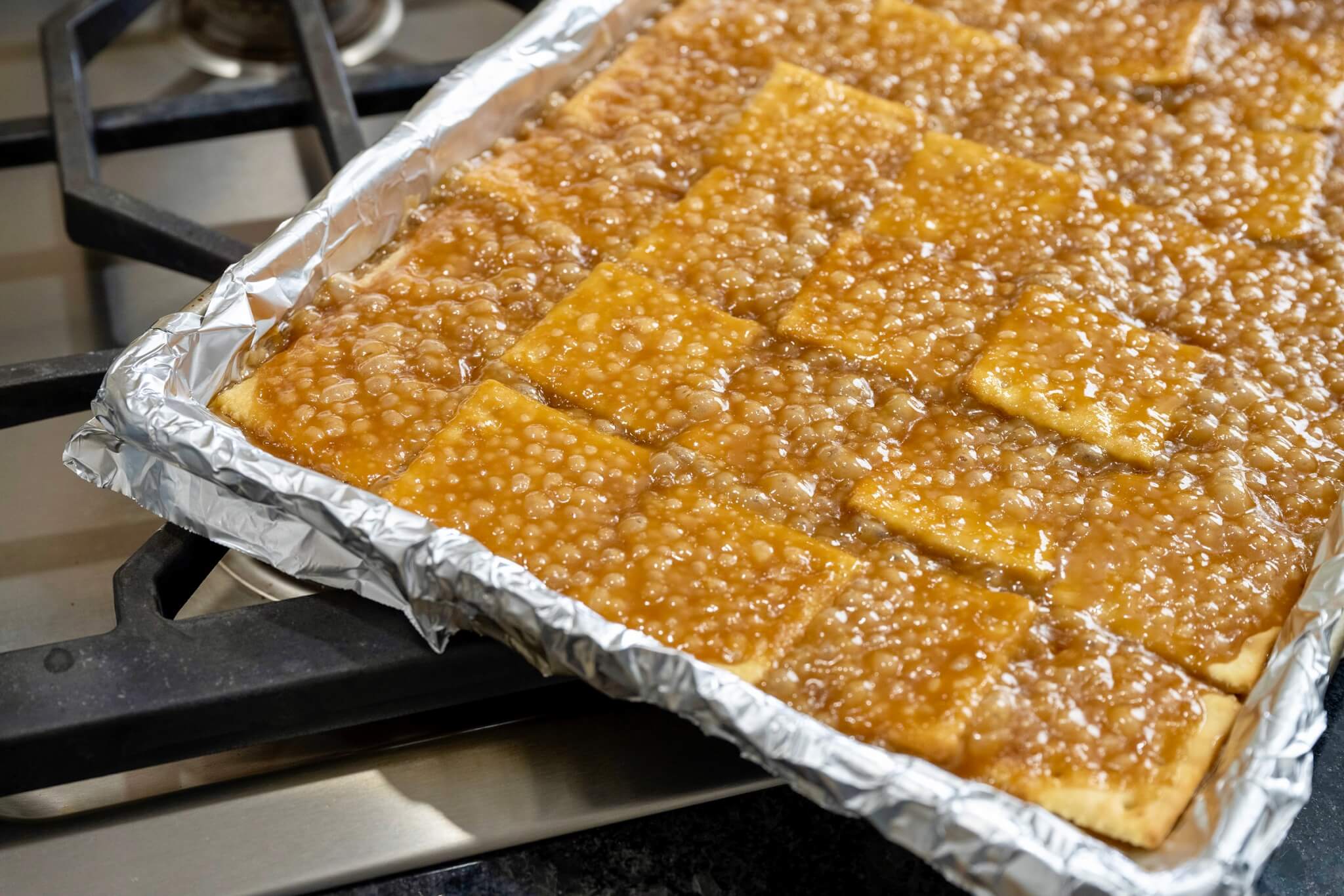 Easy to make and quick to disappear, this family-favorite treat is salty, sweet, crispy, buttery, AND chocolatey. A variety of optional toppings add to the appeal!