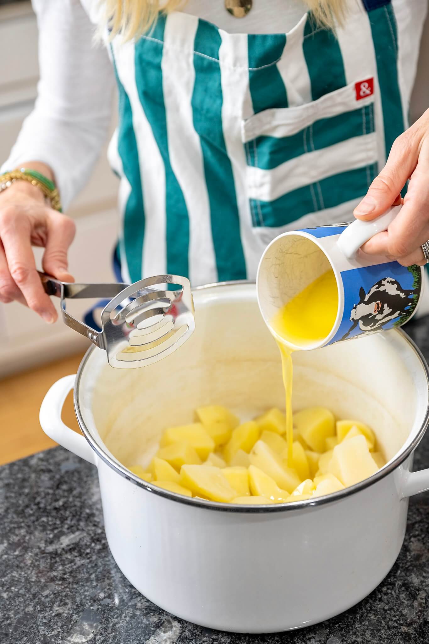 Classically light, fluffy, creamy, and buttery, this recipe is everything good mashed potatoes should be--and so simple.
