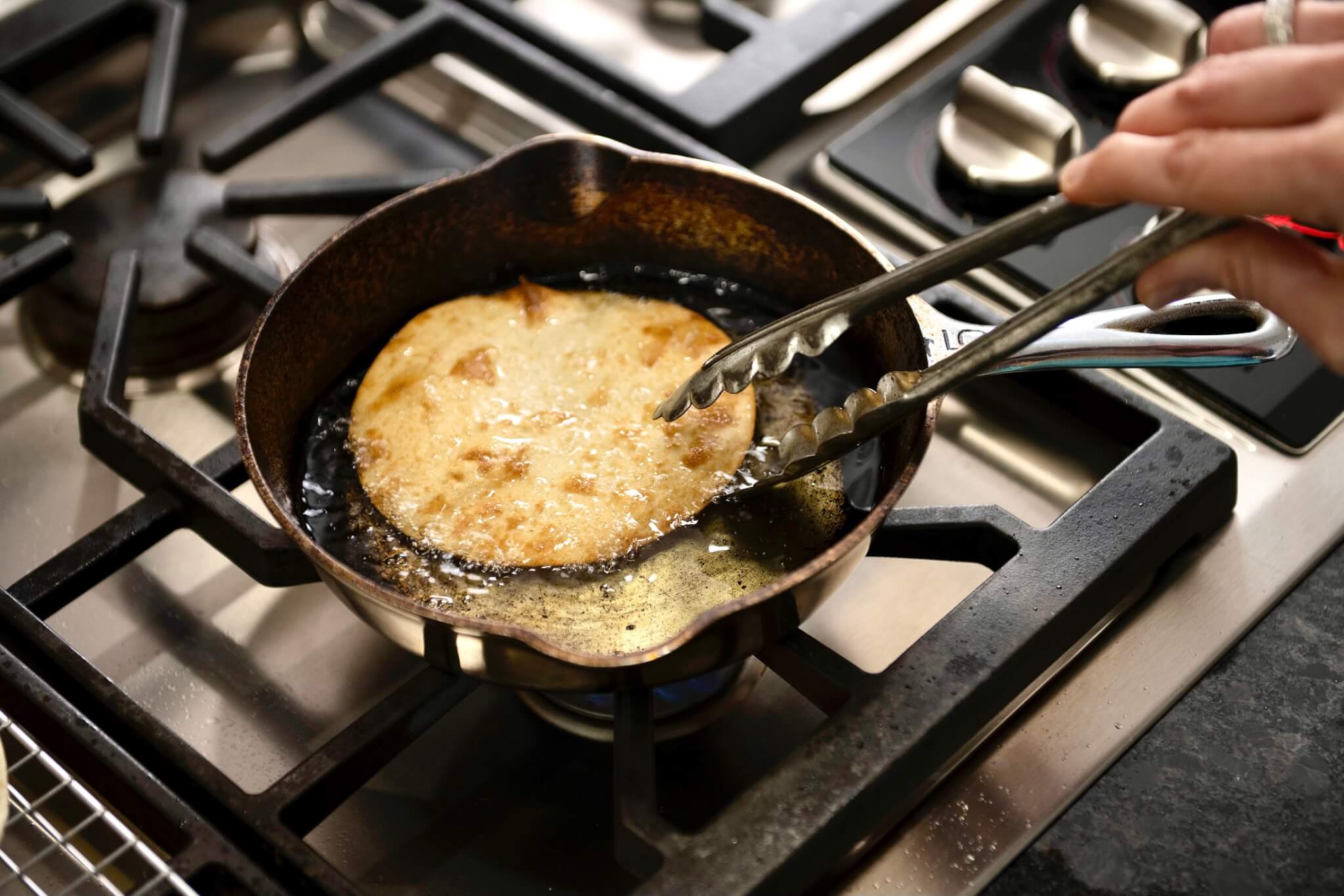 Transform a soft tortilla into a crisp, golden base for easy meals using your favorite meats, beans, cheeses, and veggies. It takes less than a minute per tortilla!