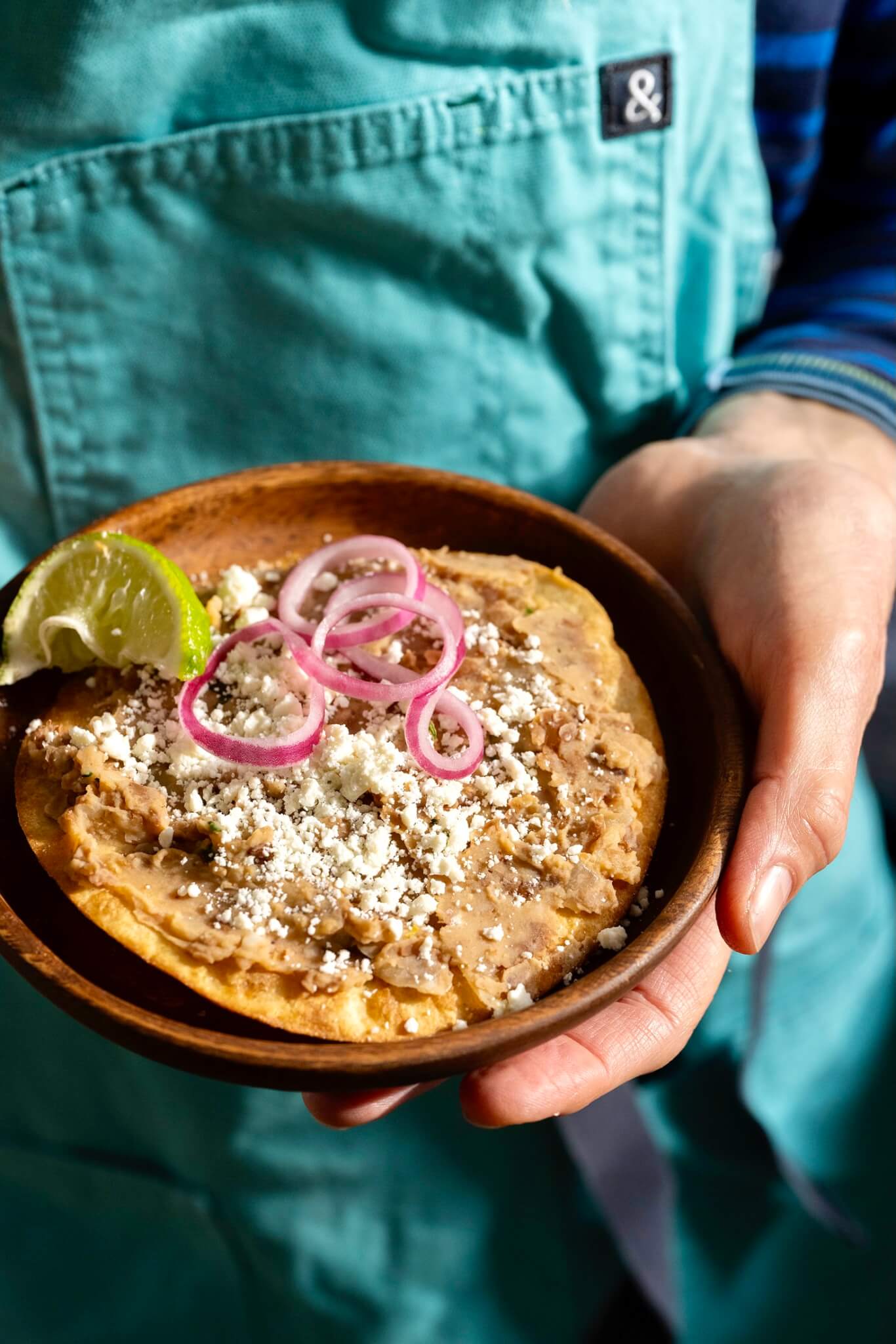 A simple tortilla can be transformed into a golden, crisp tostada in under a minute. Then top with shredded meat, refried beans, cheese, salsa, and your other favorite toppings for a quick and easy, family friendly meal.