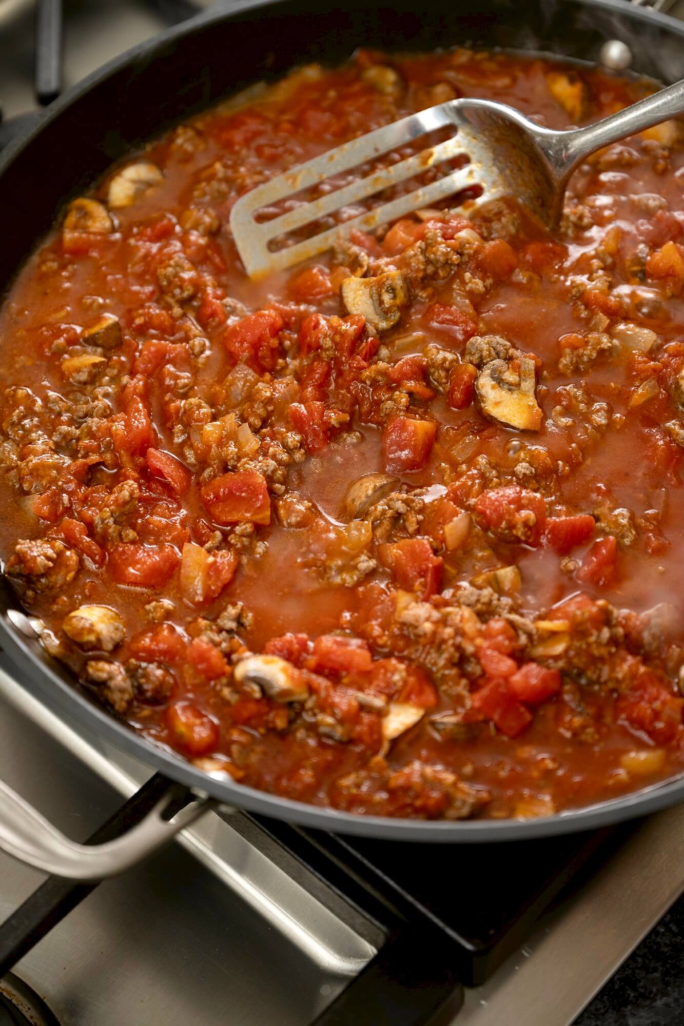 Saucy, meaty, cheesy, and delicious, this make-ahead casserole is a longtime favorite that's perfect for family dinners, casual entertaining, potlucks, and anytime you need to take a meal to a friend.