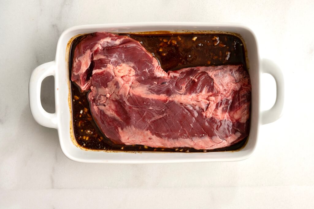 A simple but well constructed marinade produces a steak that is BURSTING with flavor, whether grilled or cooked on the stovetop. The vibrant sauce is optional but endlessly versatile.