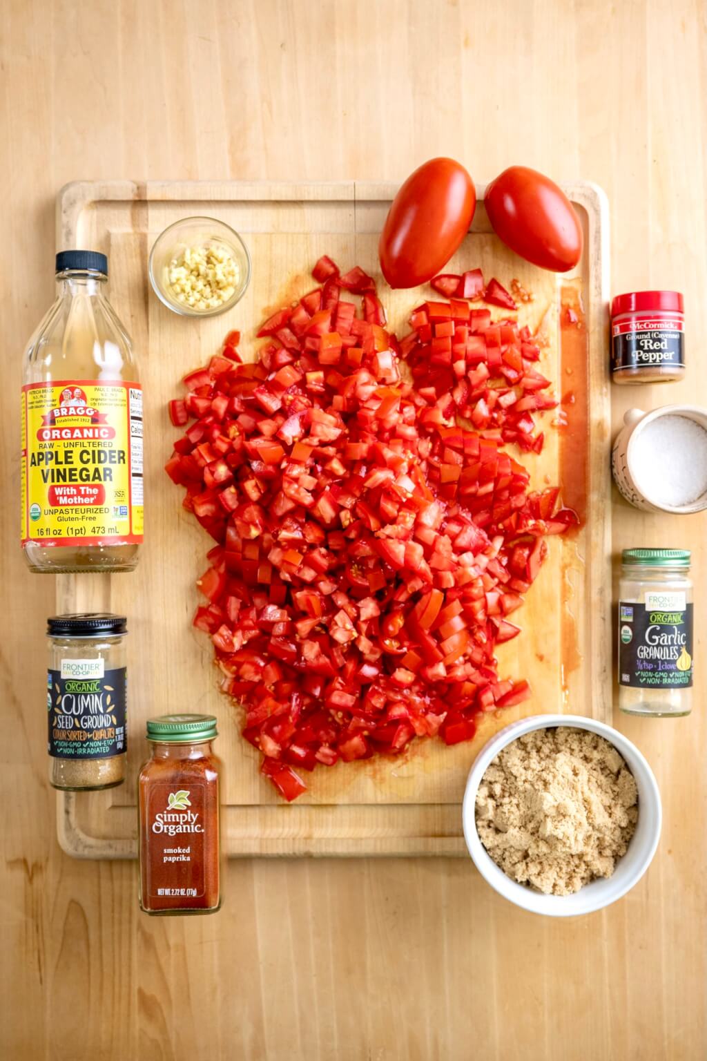 Easy-to-make tomato jam is savory and tangy with a hint of spicy sweetness. An ideal way to use a bumper crop of tomatoes, the rustic jam is a delightful alternative to ketchup on a burger or chutney on grilled chicken, fish, or pork.